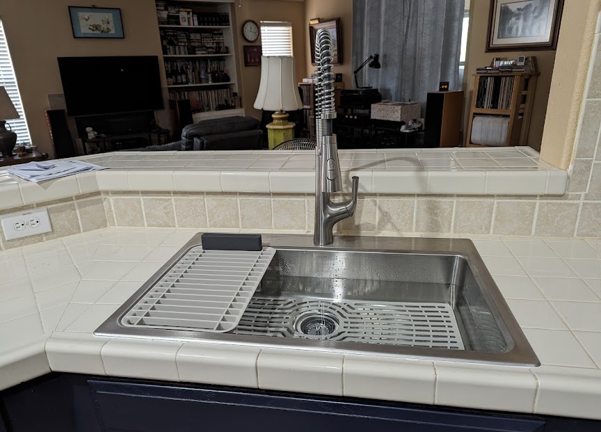 A seamless kitchen upgrade from Abacus Plumbing, Air Conditioning, & Electrical showcases clean installation and dependable faucet performance.