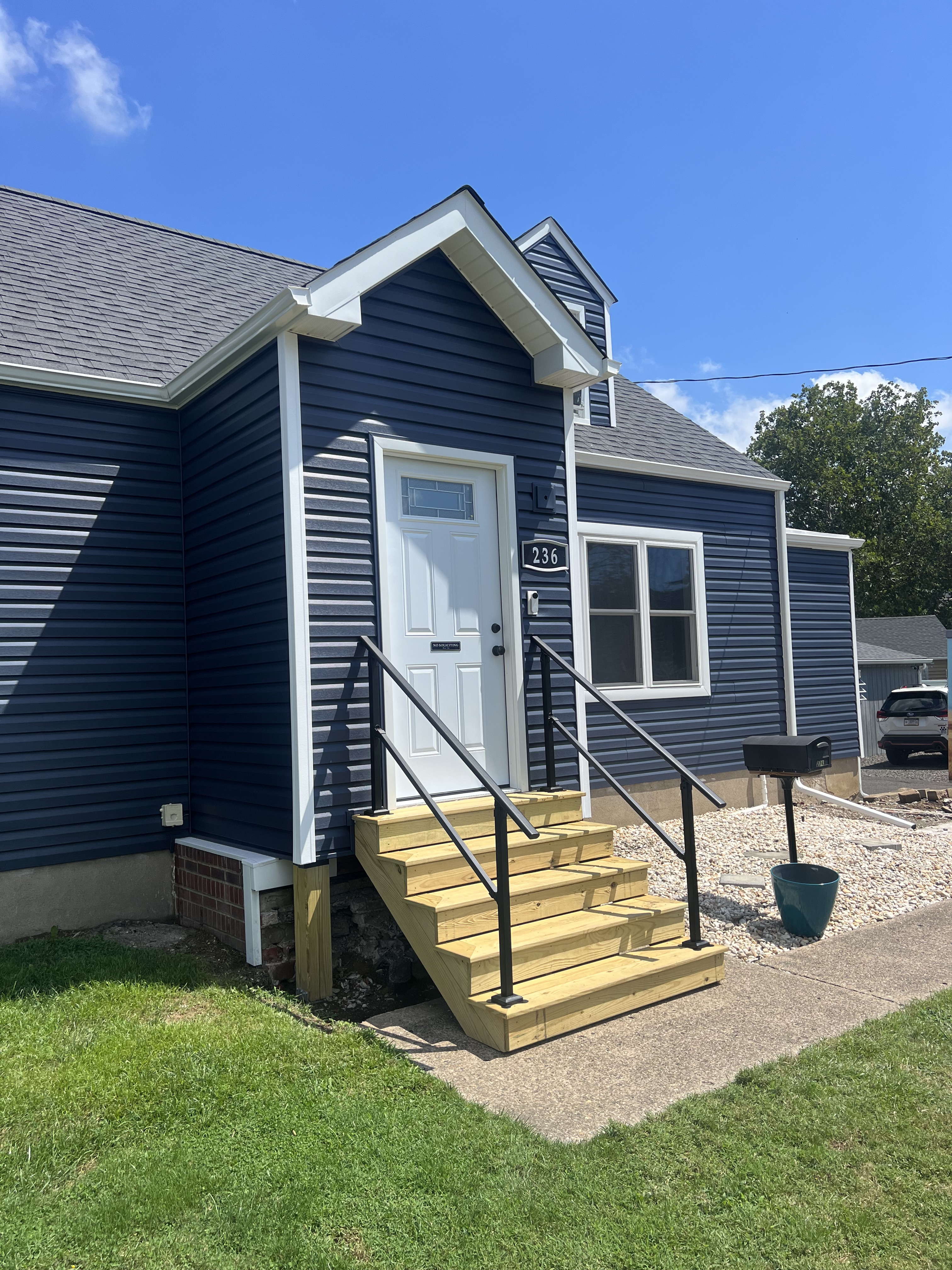 Enhance your home's curb appeal with A. Brooks Construction, Inc. Kanga Roof's expert siding and roofing services.