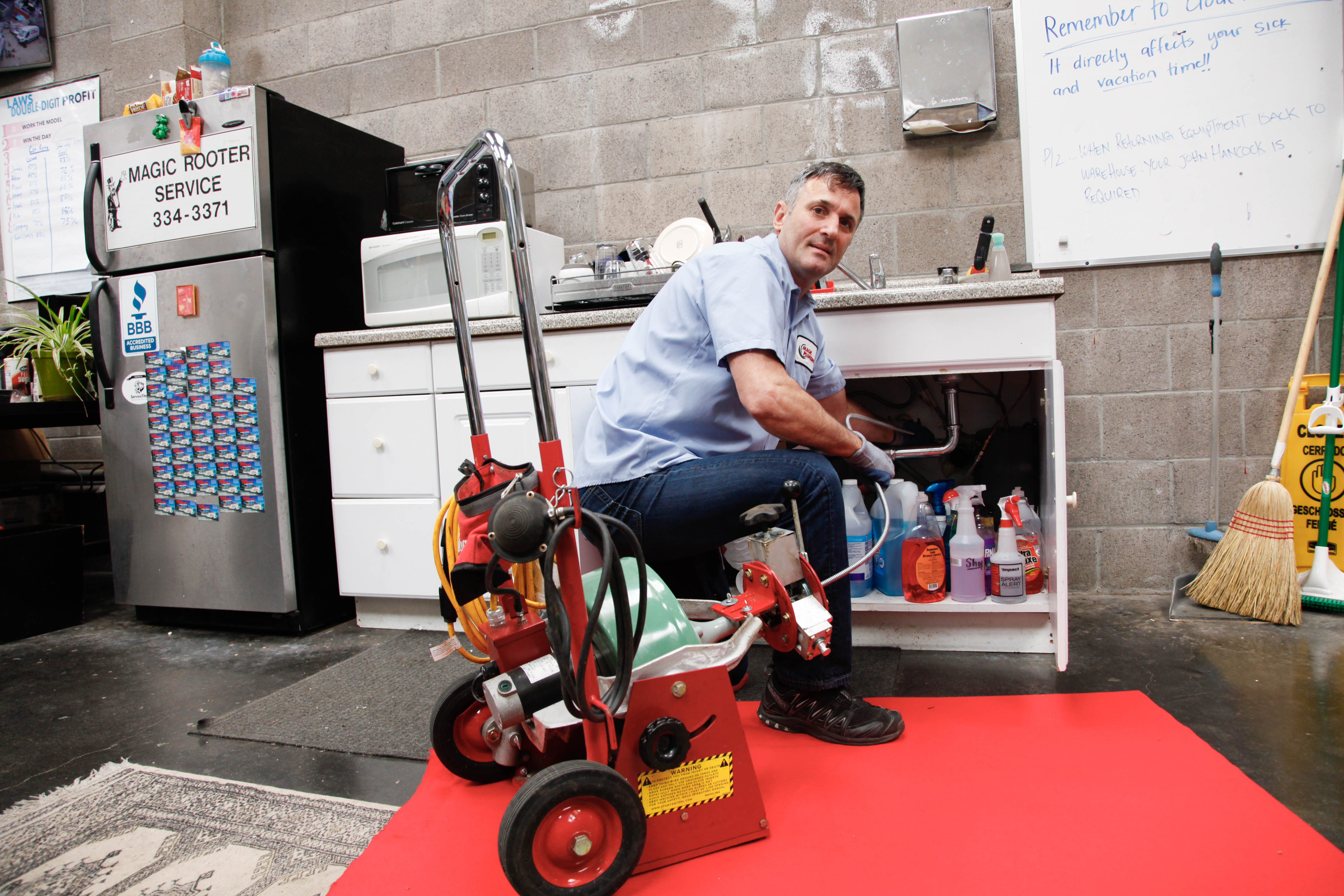 Confident, professional plumbing service from Magic Plumbing Heating & Cooling shows skilled technicians and well-equipped vans for reliable results.