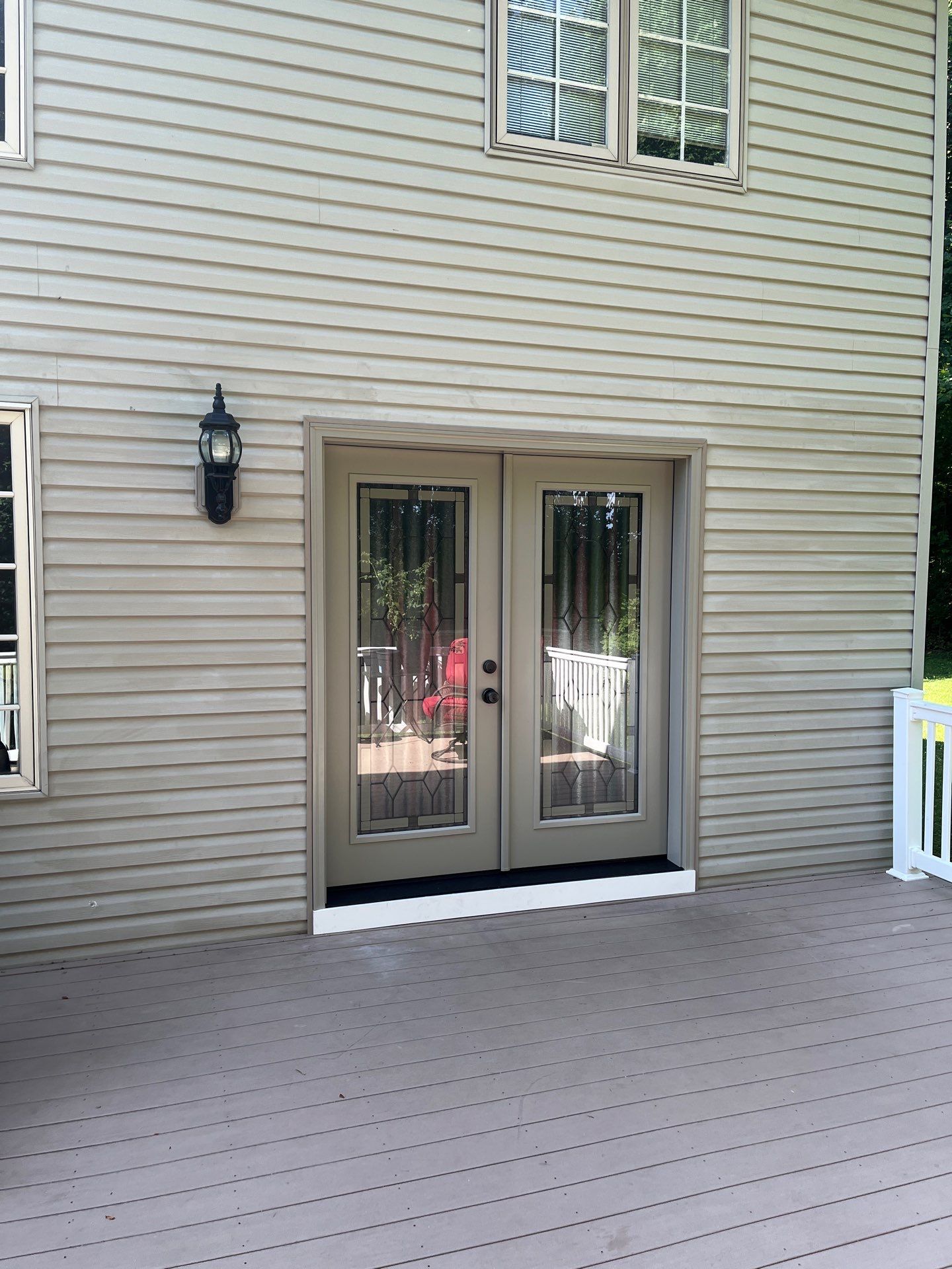 Transform your home's exterior with premium door installation from Mast Roofing & Construction.