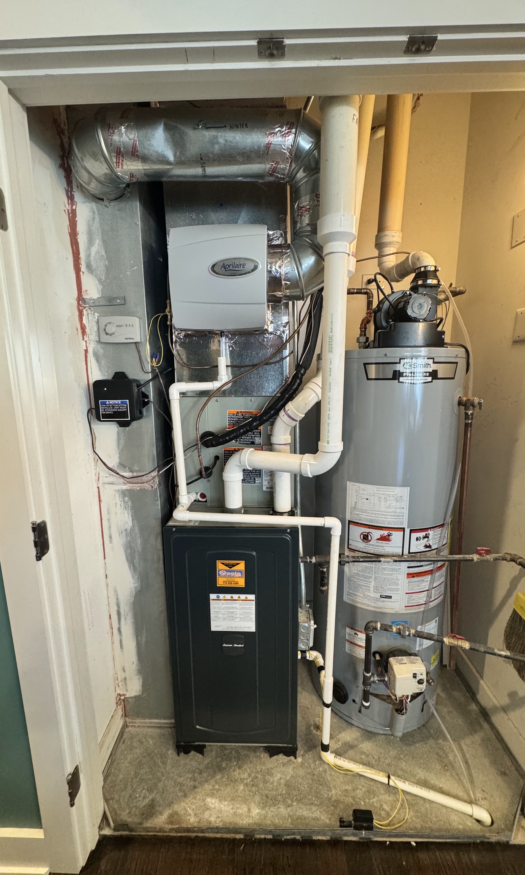 Neat, professional HVAC and water heater service showing reliable craftsmanship and attention to indoor air quality by Oasis Heating and Cooling.