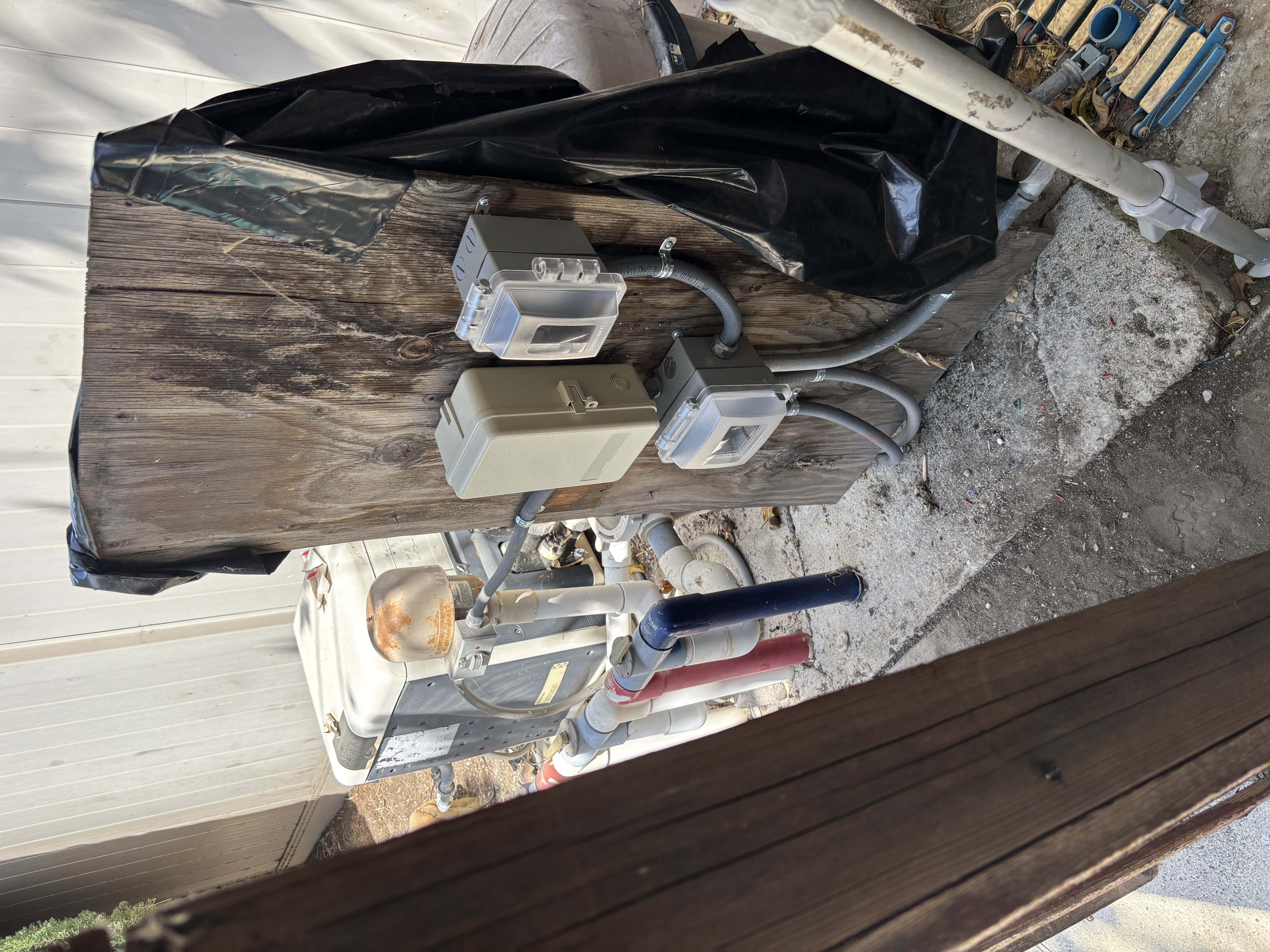 Powell Electric demonstrates reliable outdoor electrical workmanship with neatly mounted junctions and secure conduit to protect pool equipment.