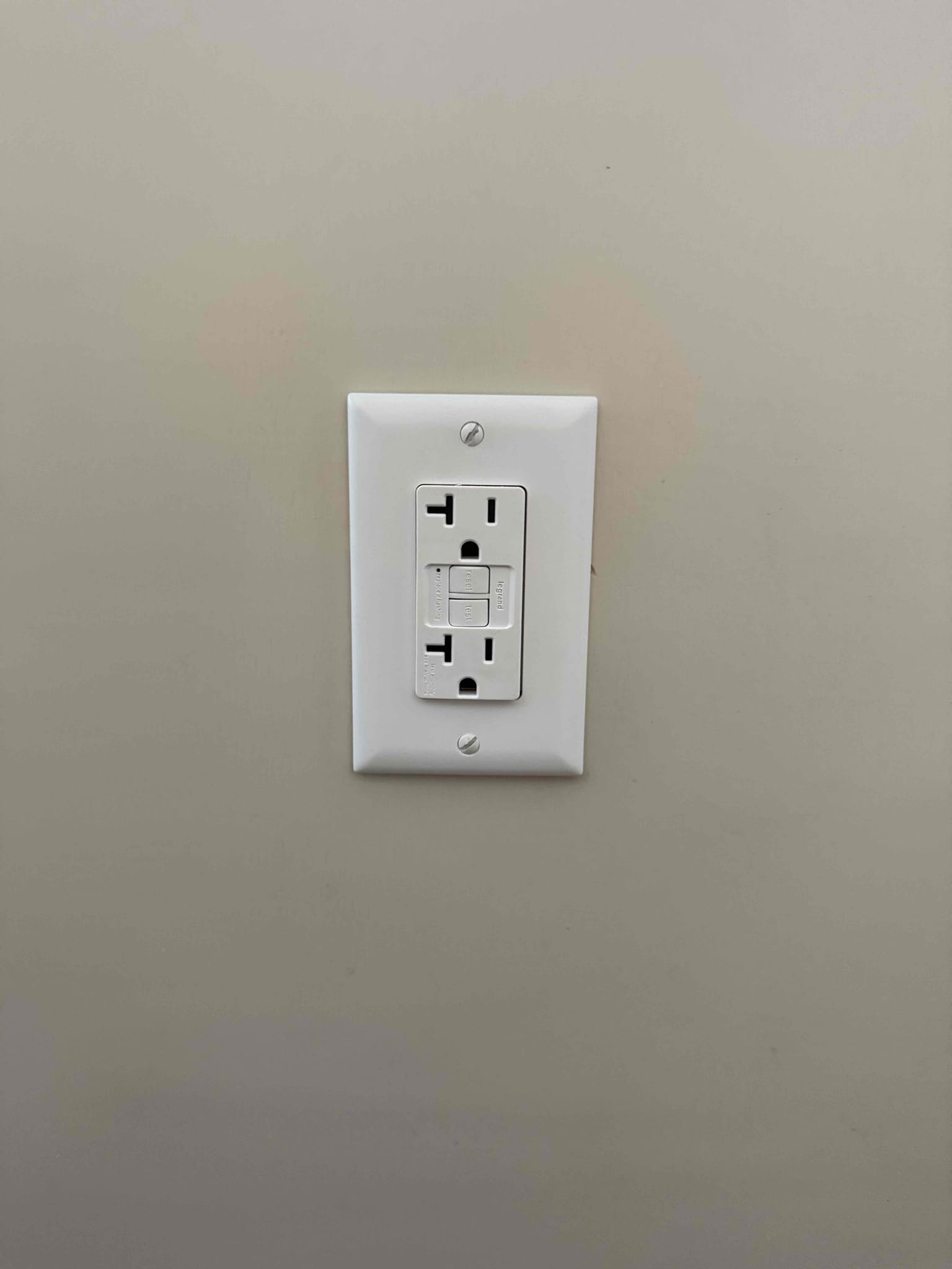 A neat GFCI installation showcases reliable, safety-focused electrical work by Dawson's Electric & Air for lasting peace of mind.