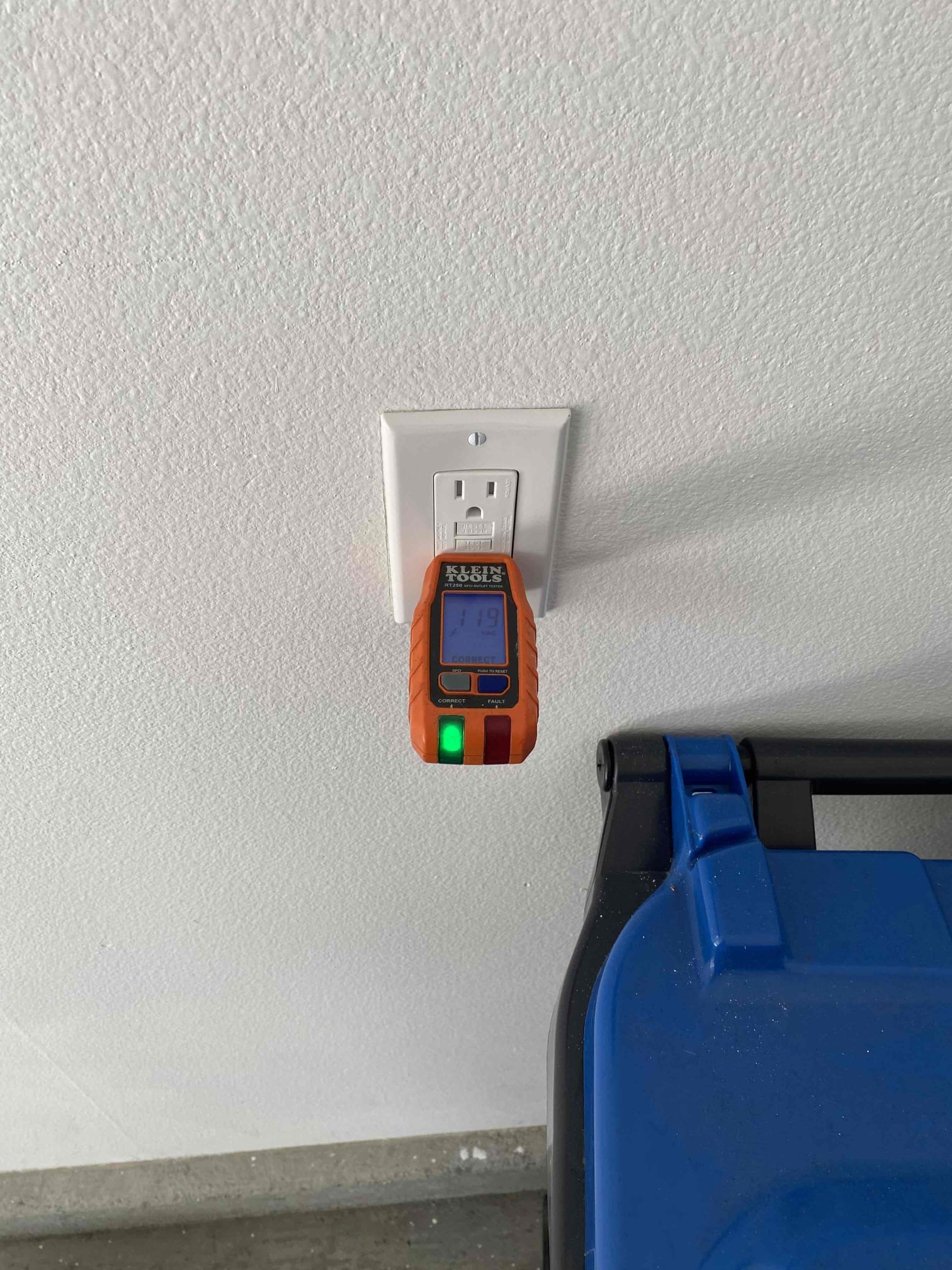 Powell Electric verifies outlet safety and performance on-site, demonstrating careful workmanship and reliable testing for homeowner peace of mind.