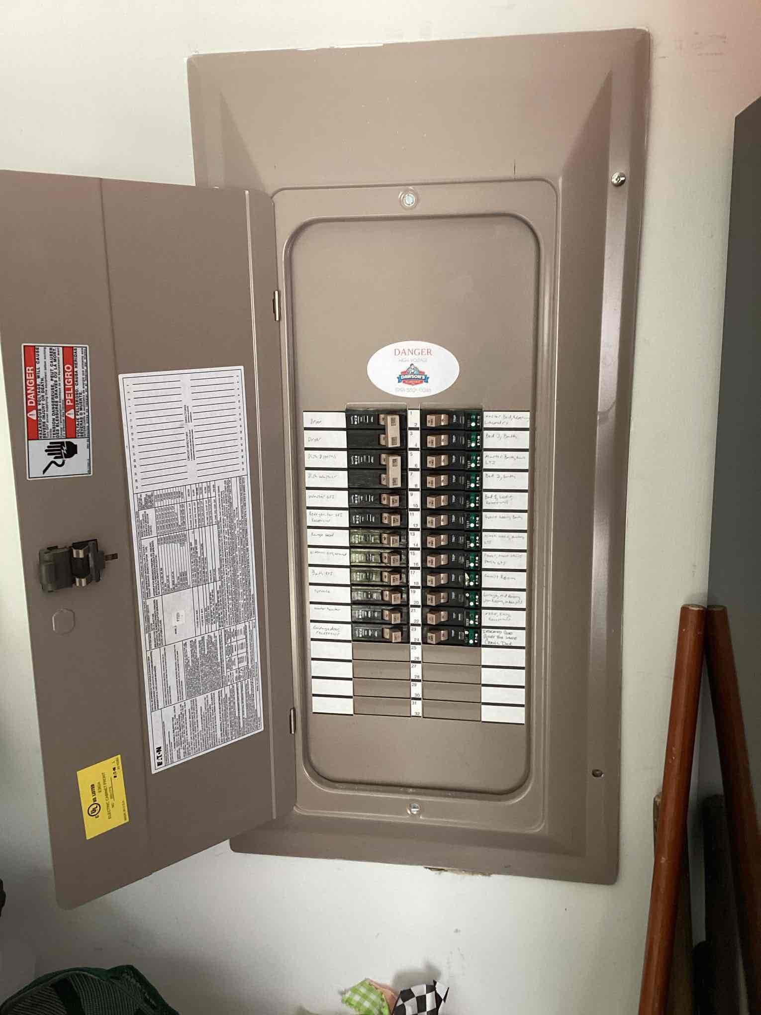 Neat, safety-minded electrical work from Dawson's Electric & Air shows organized labeling and clean installation for reliable home protection.