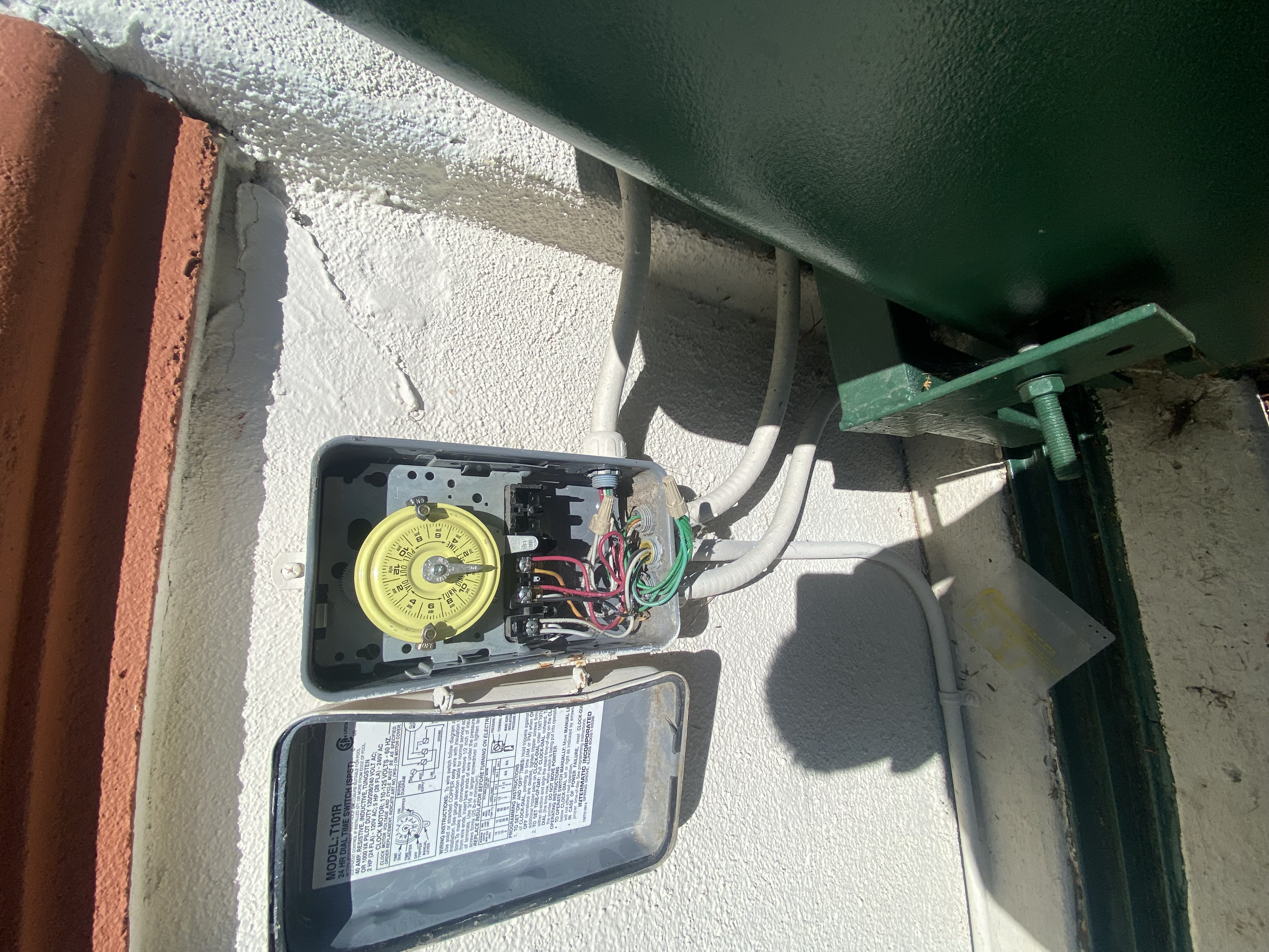 Powell Electric shows reliable outdoor timer installation and neat wiring, providing dependable control and clear labeling for easy service.