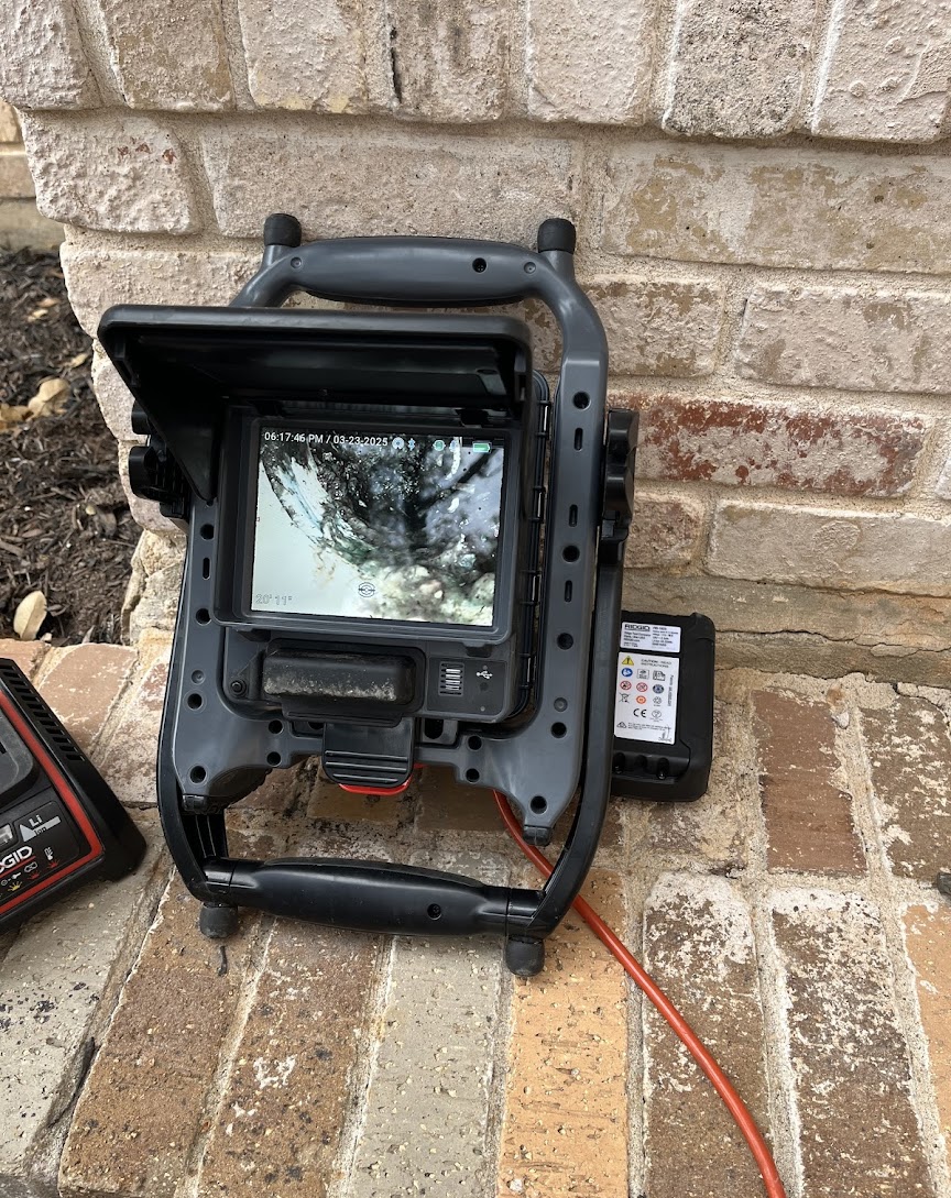 Thorough diagnostics and clear results build customer trust, as shown by Abacus Plumbing, Air Conditioning, & Electrical using professional inspection equipment.