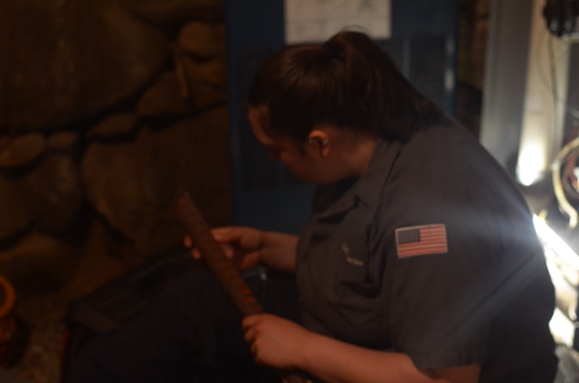 Lloyd Plumbing, Heating, Air, Electrical demonstrates hands-on professionalism and care while our technician inspects system components for lasting results.