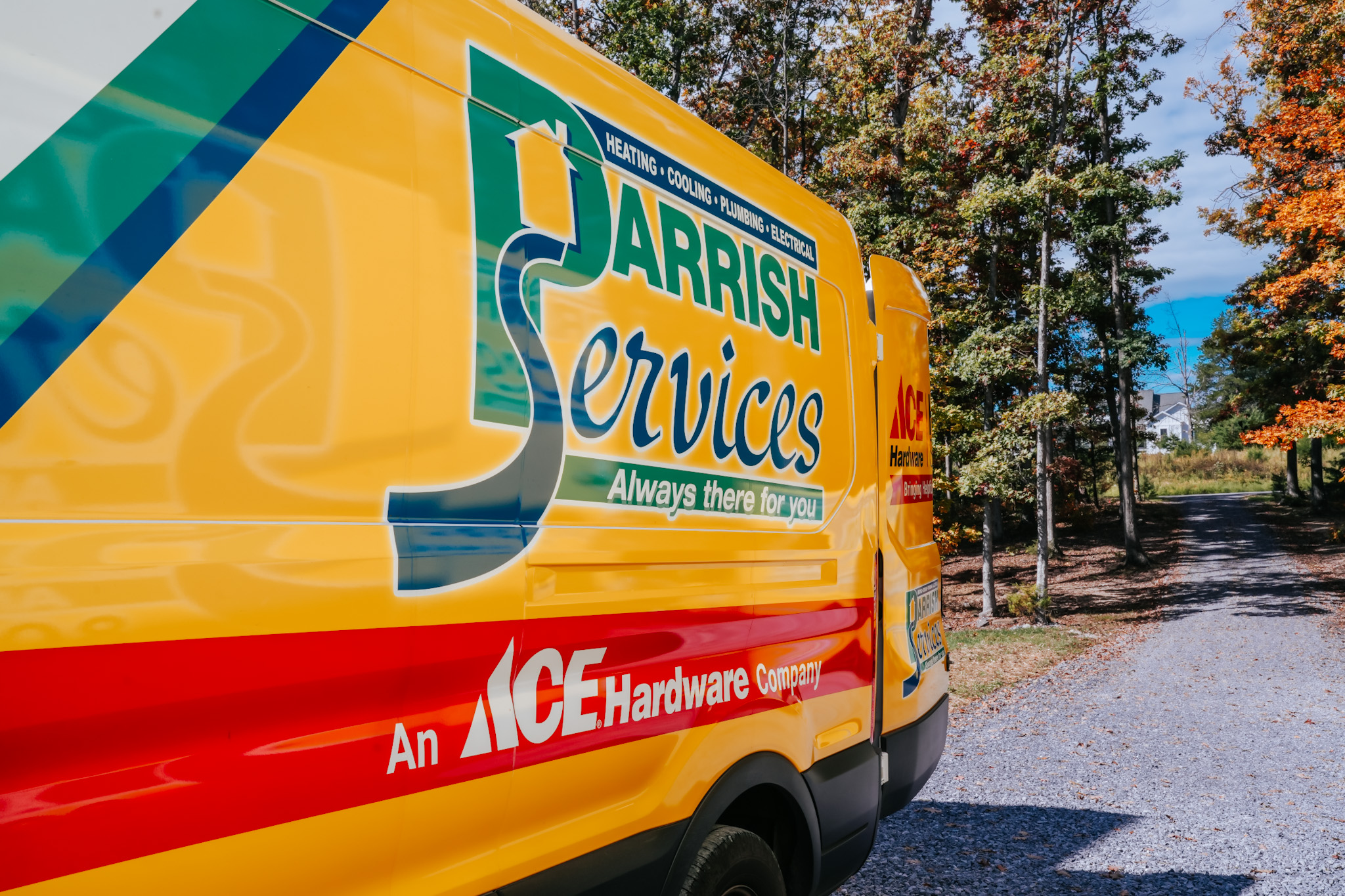 Parrish Services shows dependable, professional home service presence with branded vehicles that underscore trust and prompt response.