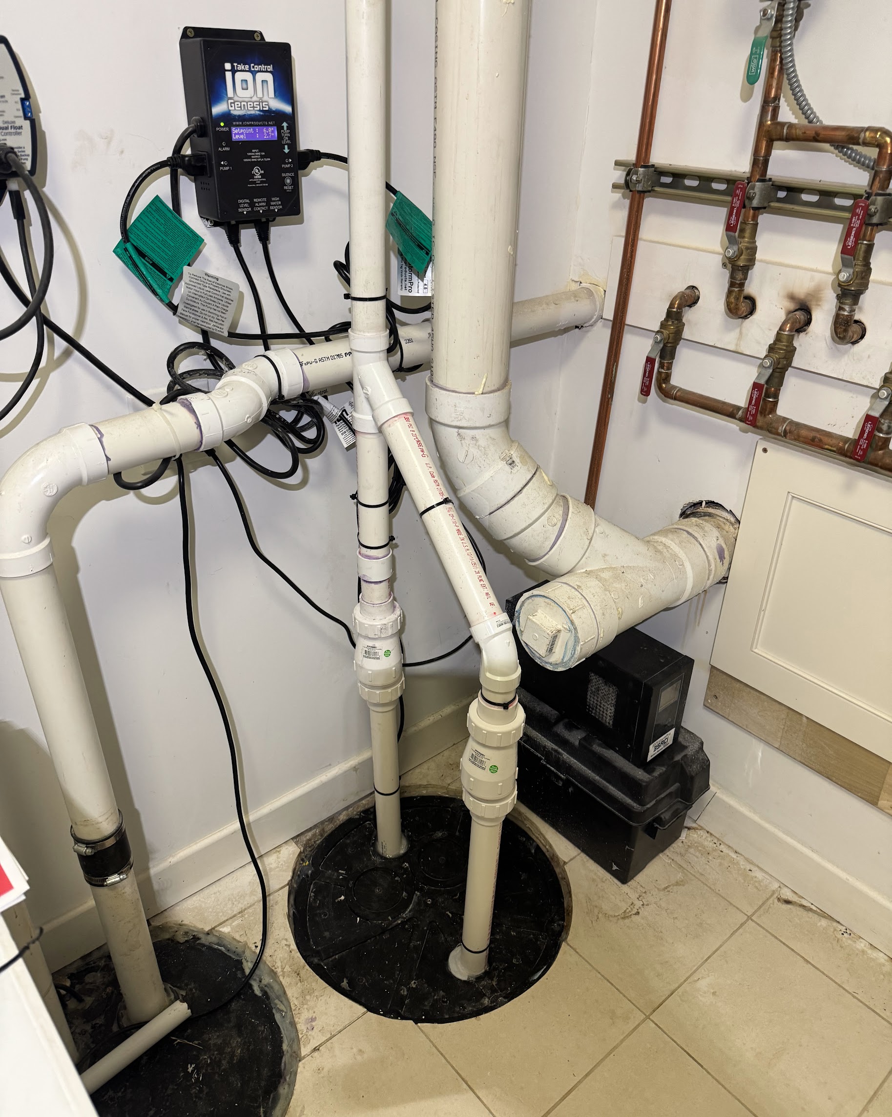 Reliable workmanship shows in the neatly installed sump and drain system, giving homeowners confidence with Oasis Heating and Cooling on standby.
