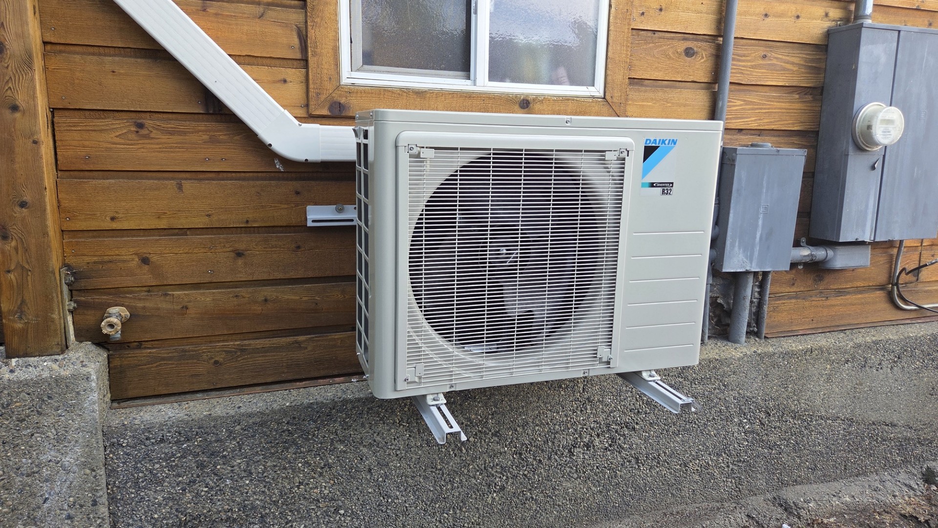 Home Heating & Air Conditioning demonstrates precise, tidy installation with a compact Daikin outdoor unit mounted securely for long lasting performance.