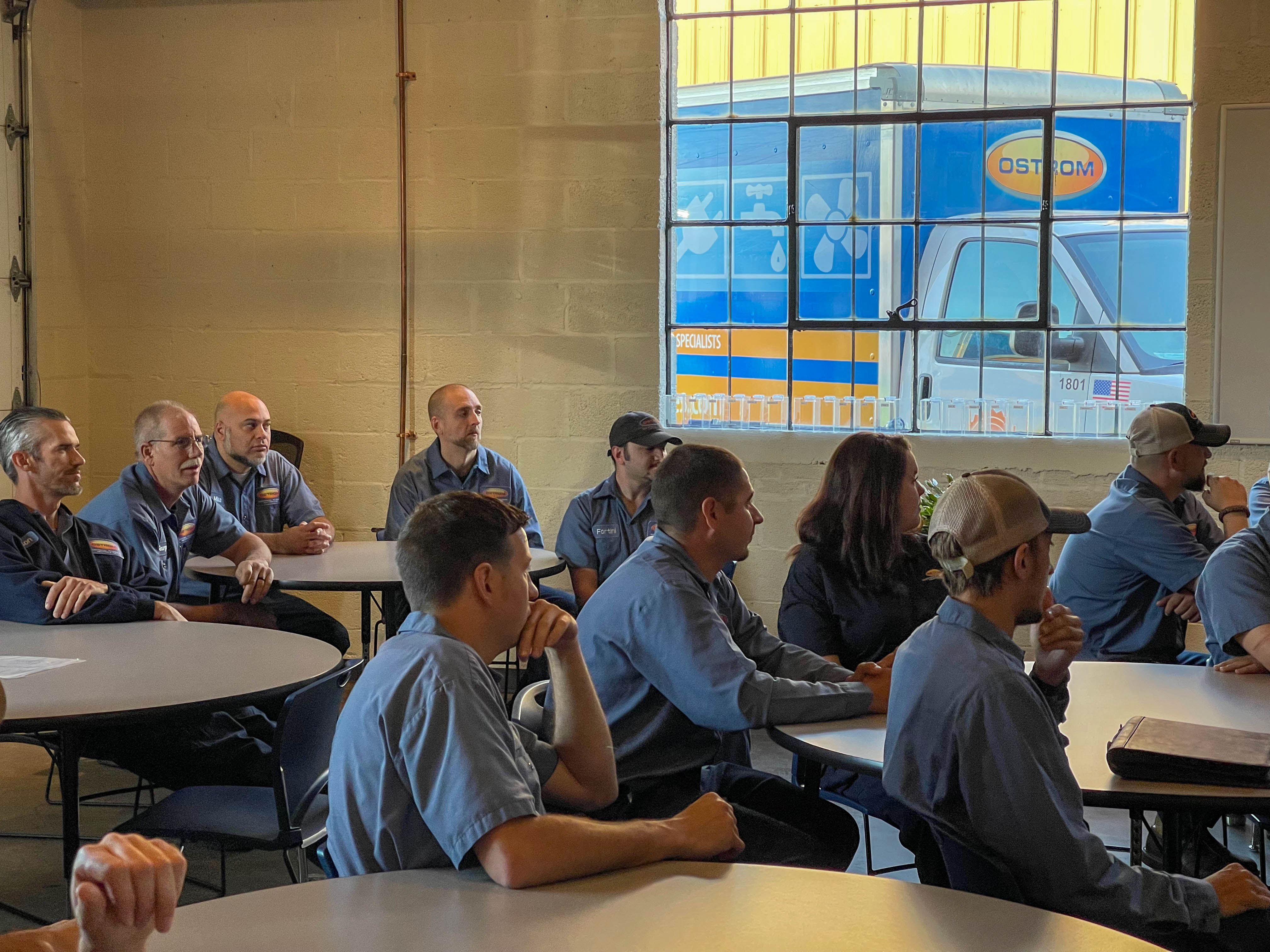 Ostrom Electrical Plumbing Heating & Air Conditioning exemplifies professionalism and teamwork through skilled, uniformed staff, ready to tackle any project with expertise.