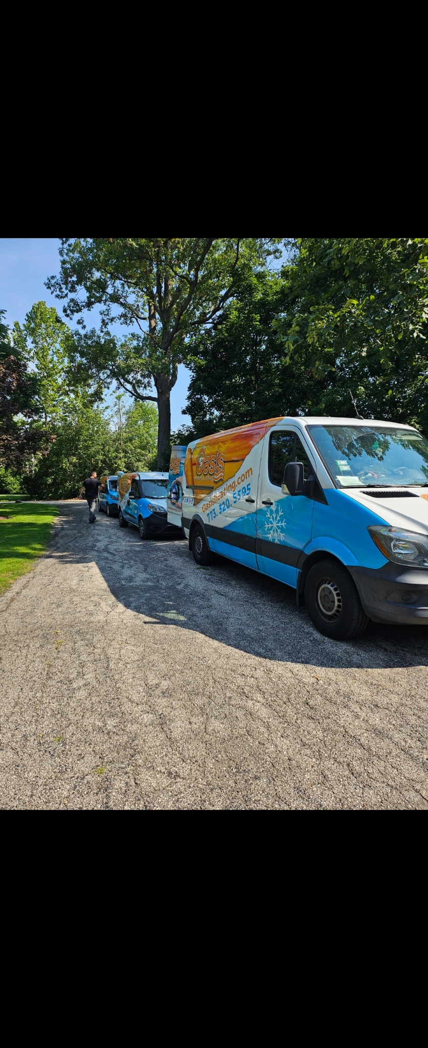A dependable team arrives ready to service your home, with Oasis Heating and Cooling showing reliable, professional care.