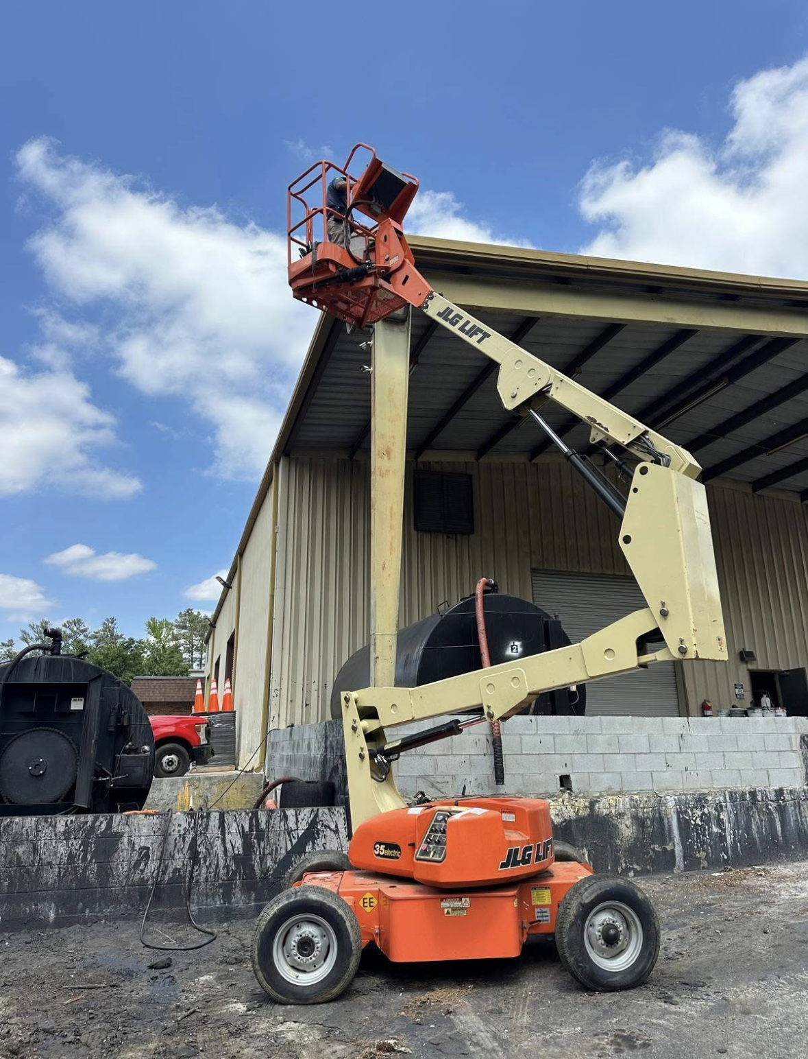 Kalahari Electrical Services demonstrates reliable on-site professionalism, using skilled crews and proper lift equipment for safe exterior electrical work.