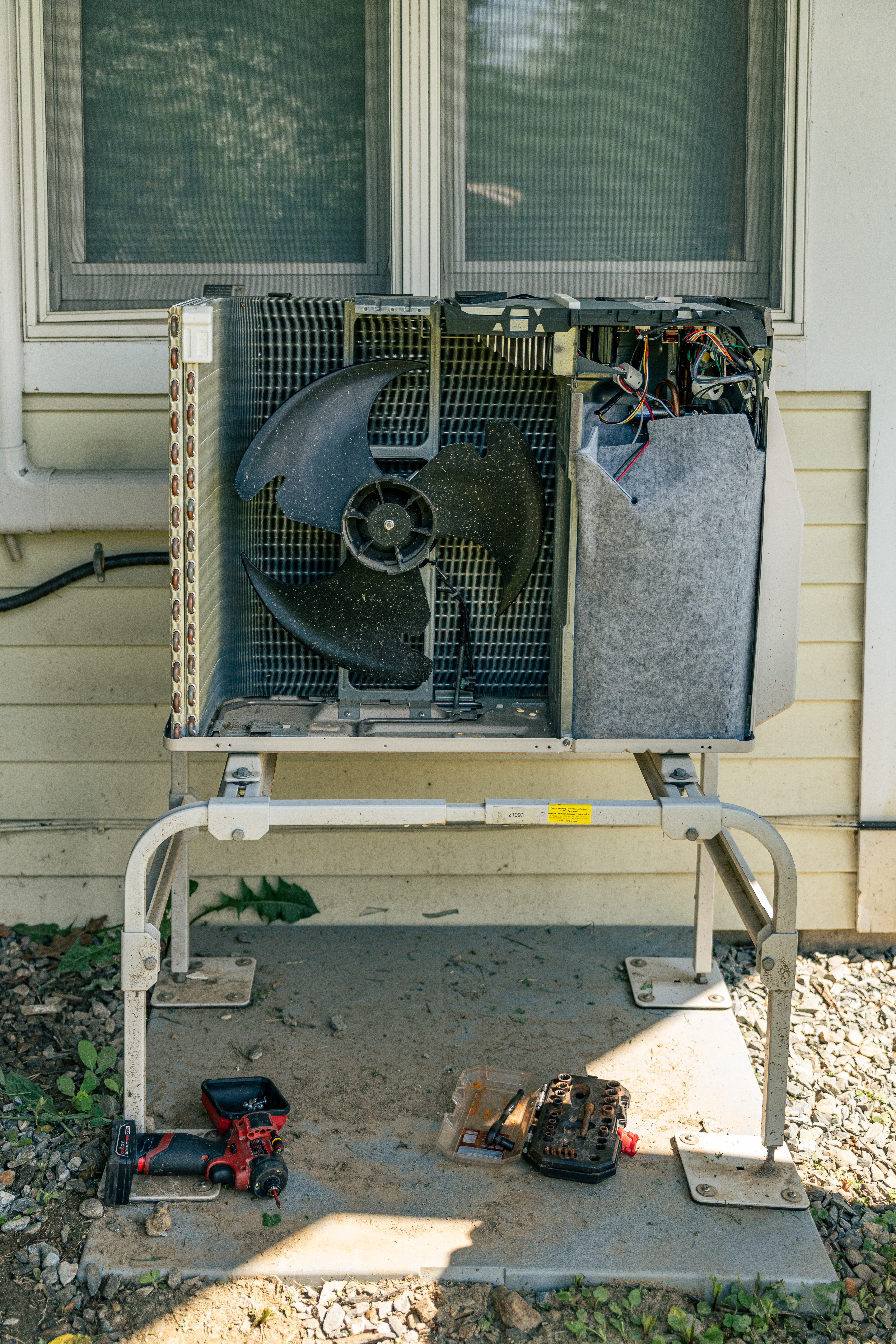 Trust Lloyd Plumbing, Heating, Air, Electrical for careful on-site HVAC repairs, showing focused technicians and tidy work practices for lasting performance.