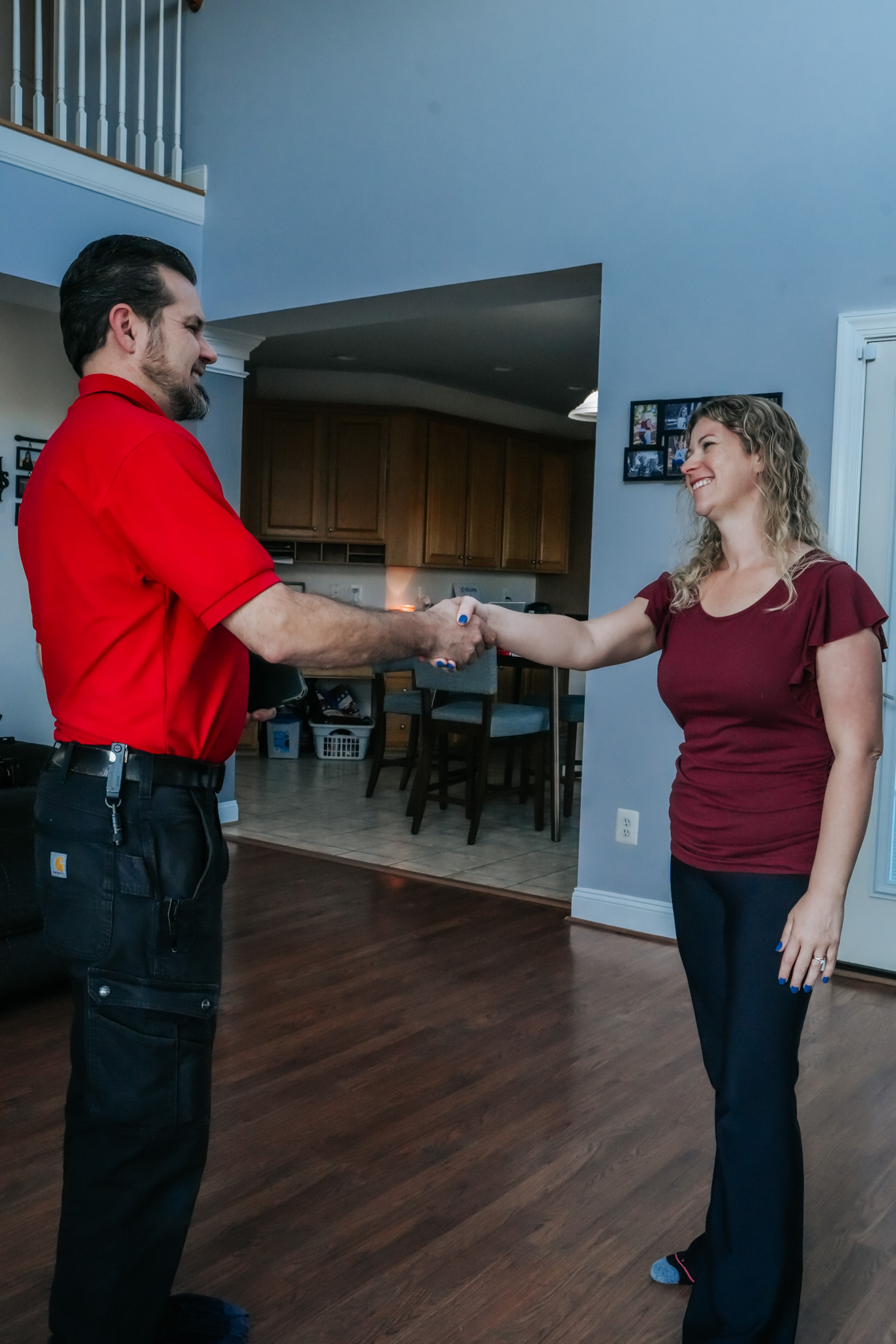 A friendly handshake after a reliable in-home service shows Parrish Services prioritizes trust and professional care for your home.