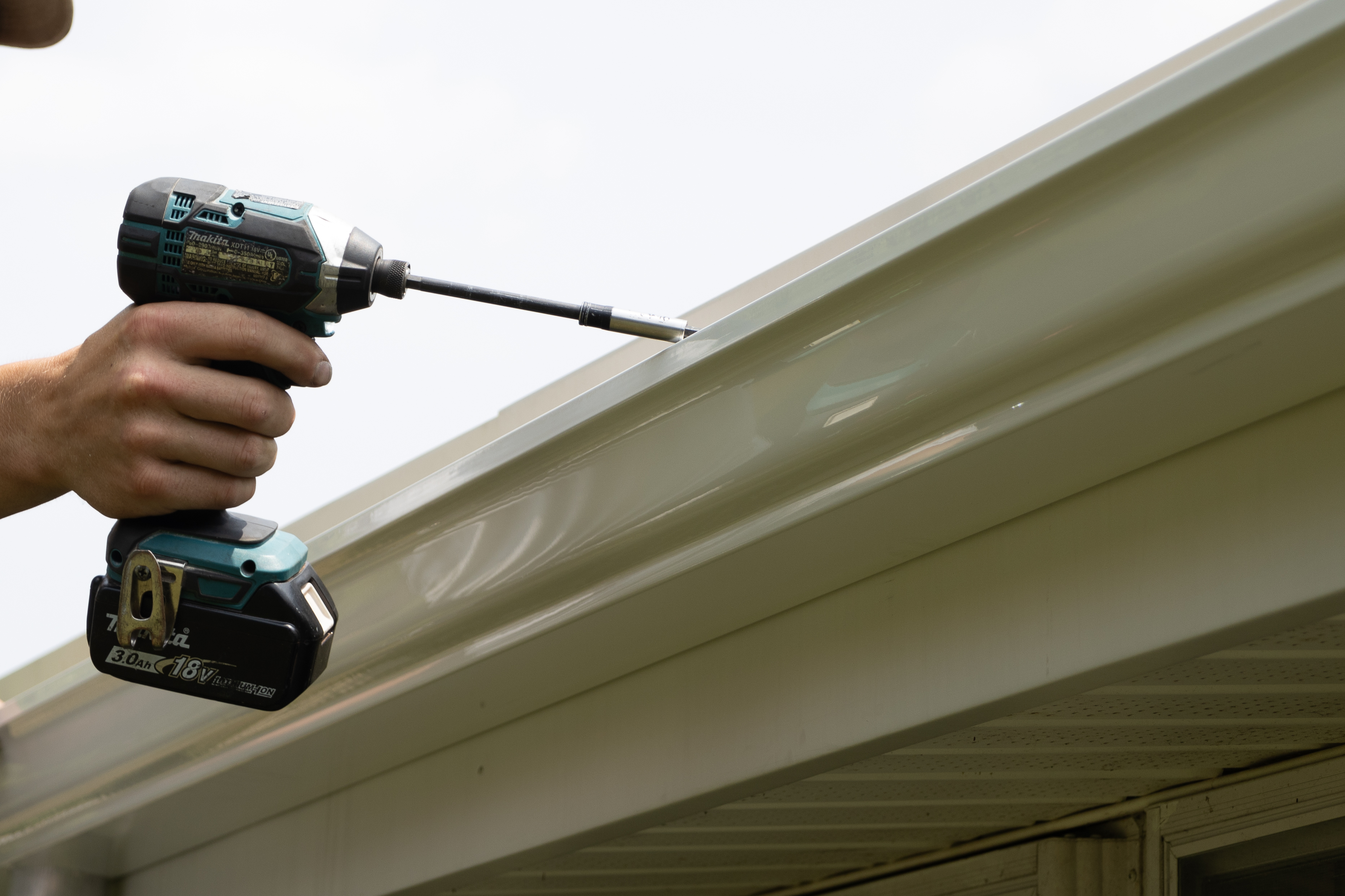 Experience superior craftsmanship with Mast Roofing & Construction's precision gutter services.