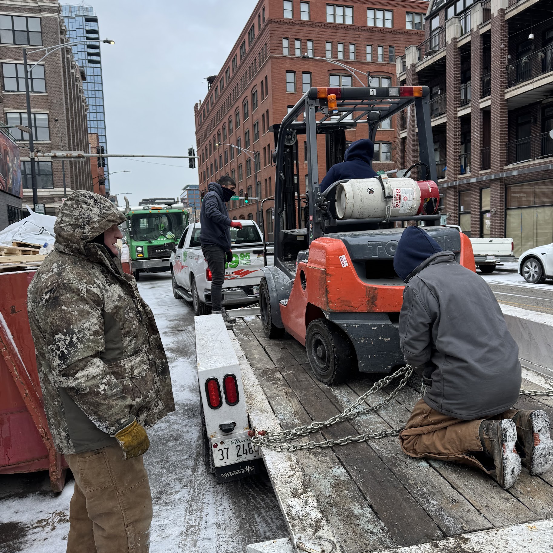 Working through winter to safely transport equipment, Oasis Heating and Cooling shows dependable service and commitment to job safety.