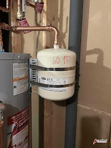 A properly installed, labeled expansion tank showcases the craftsmanship and reliability customers expect from Cardinal Plumbing Heating & Air Inc.