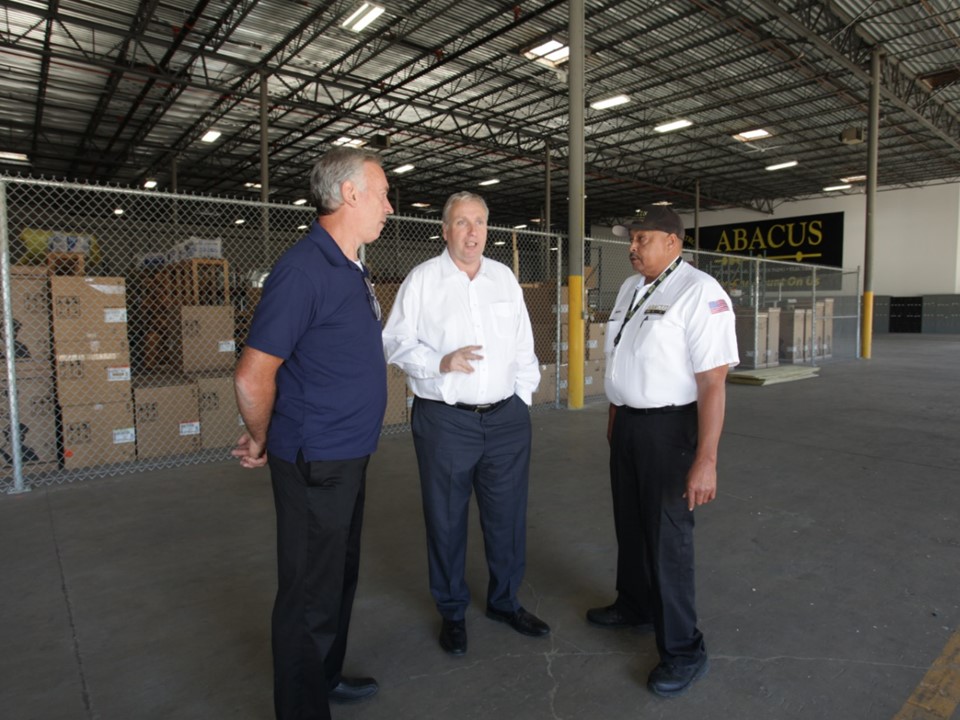 Inside a well-organized facility, Abacus Plumbing, Air Conditioning & Electrical demonstrates professional teamwork and readiness to serve customers reliably.