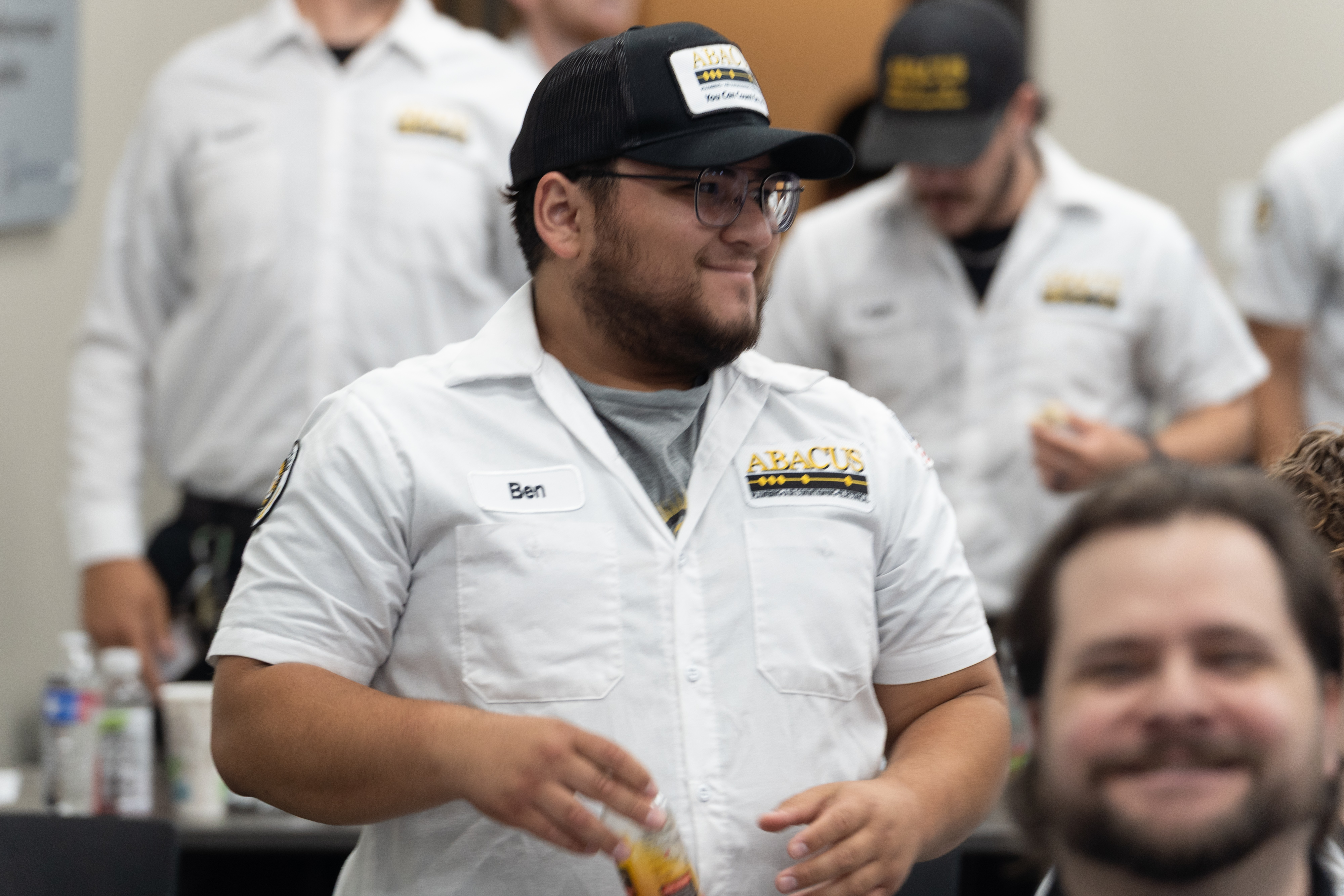 Friendly, professional team members at Abacus Plumbing, Air Conditioning, & Electrical showcase the company’s approachable service and reliable workmanship.