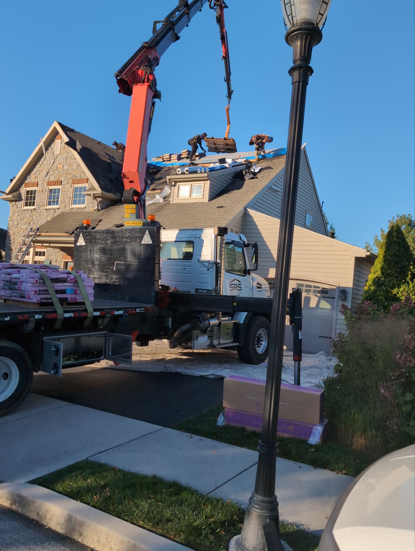 Skilled crews from Mosaic Roofing & Exteriors safely replace shingles with careful site protection and efficient material handling.