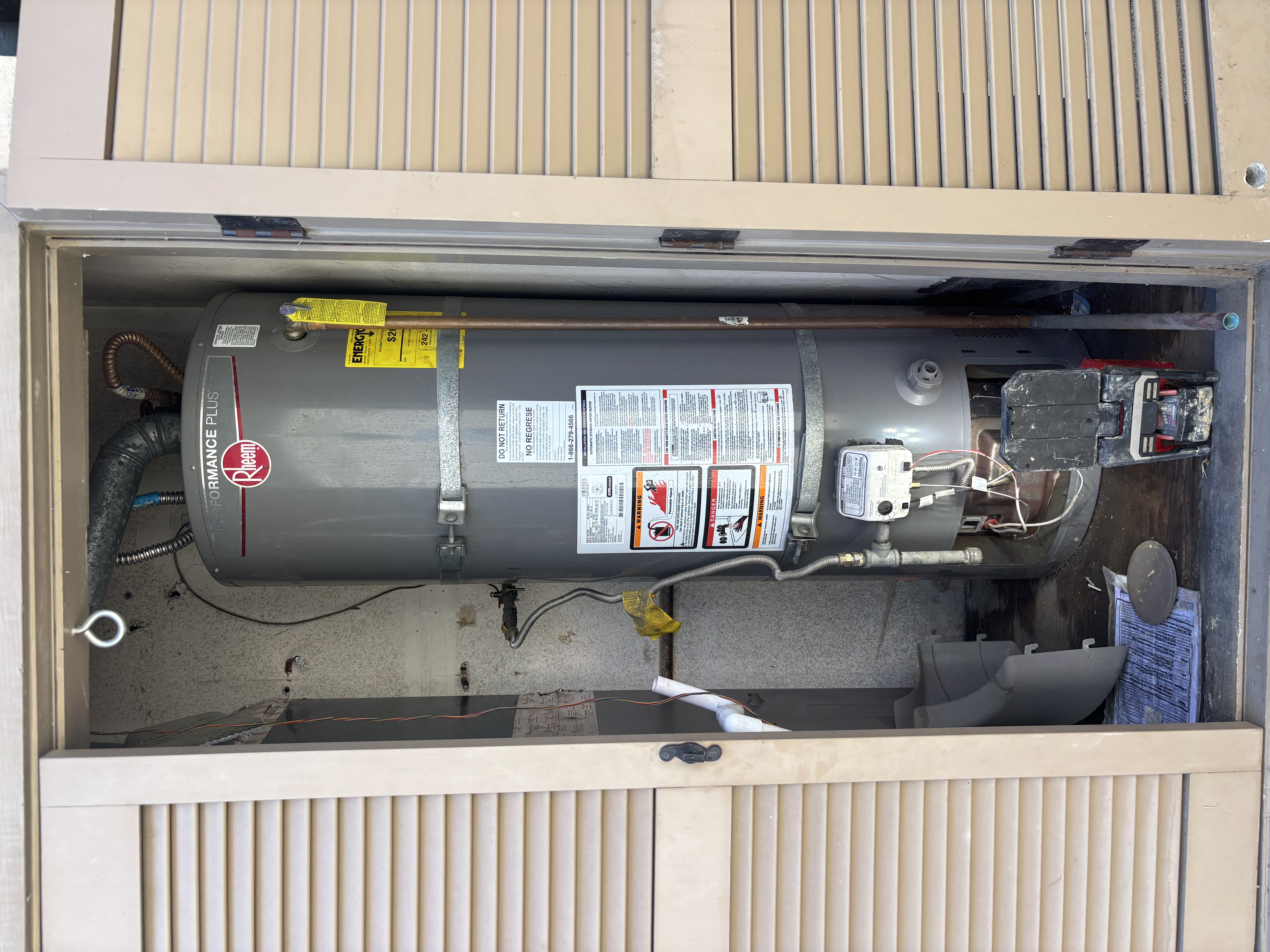 Professional installation and reliable performance from Island Plumbing, showcasing a securely mounted water heater with clear service access.