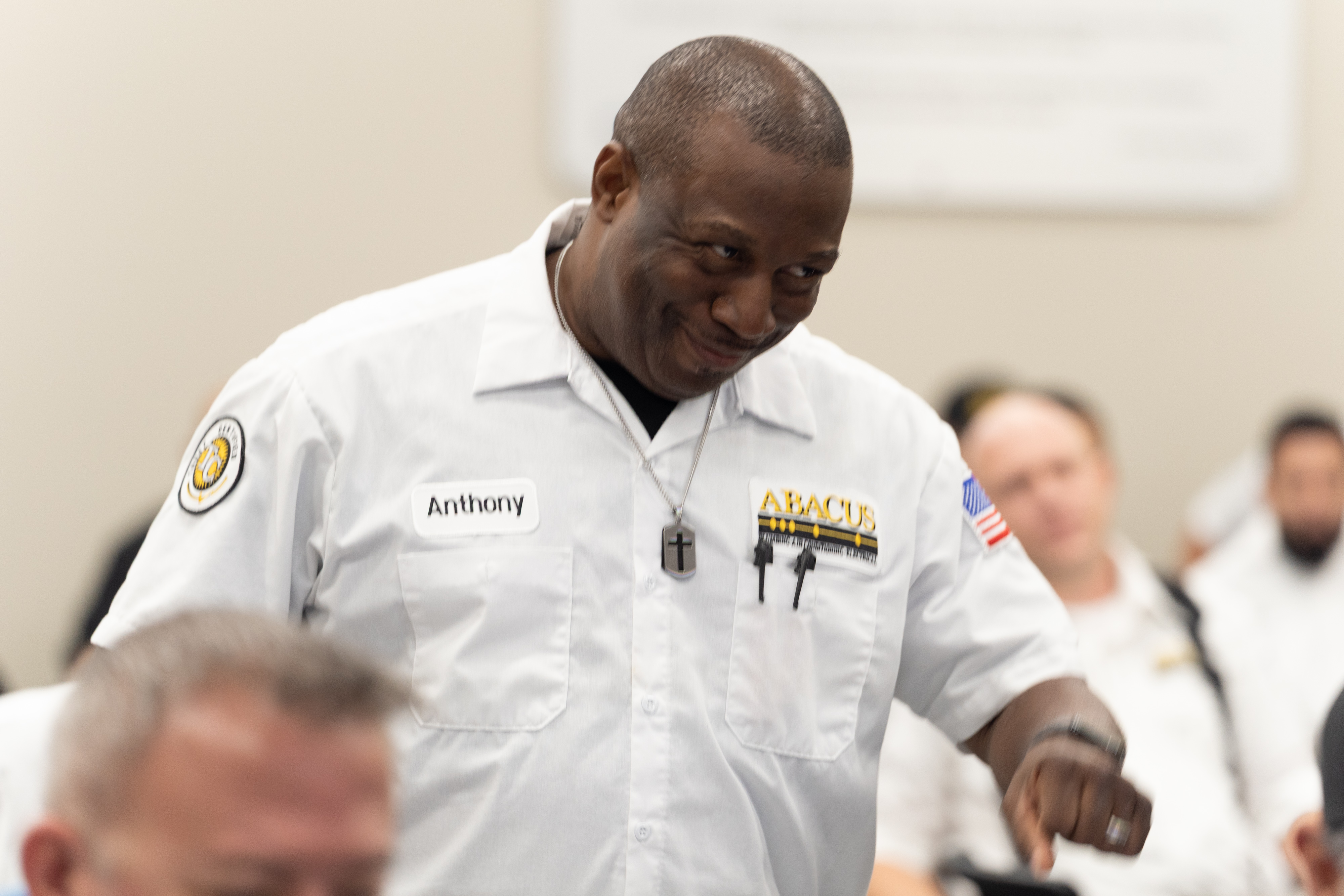 Friendly, professional technicians make customers feel confident, as shown by Abacus Plumbing, Air Conditioning, & Electrical team engagement during training.