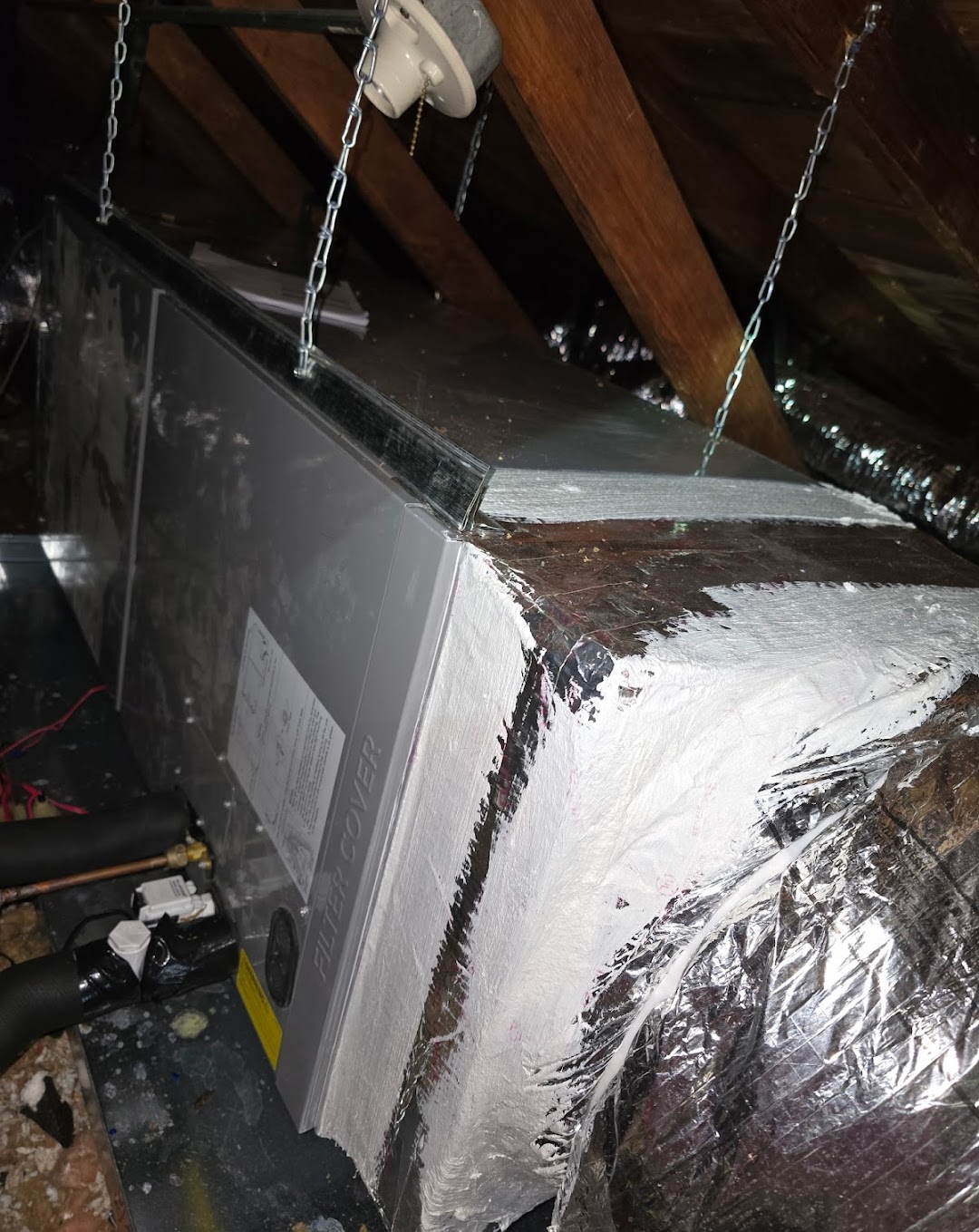 Experience top-tier HVAC installations with Ridge Energy Savers Inc. Heating & Air Conditioning, ensuring year-round comfort and reliability in your attic space.