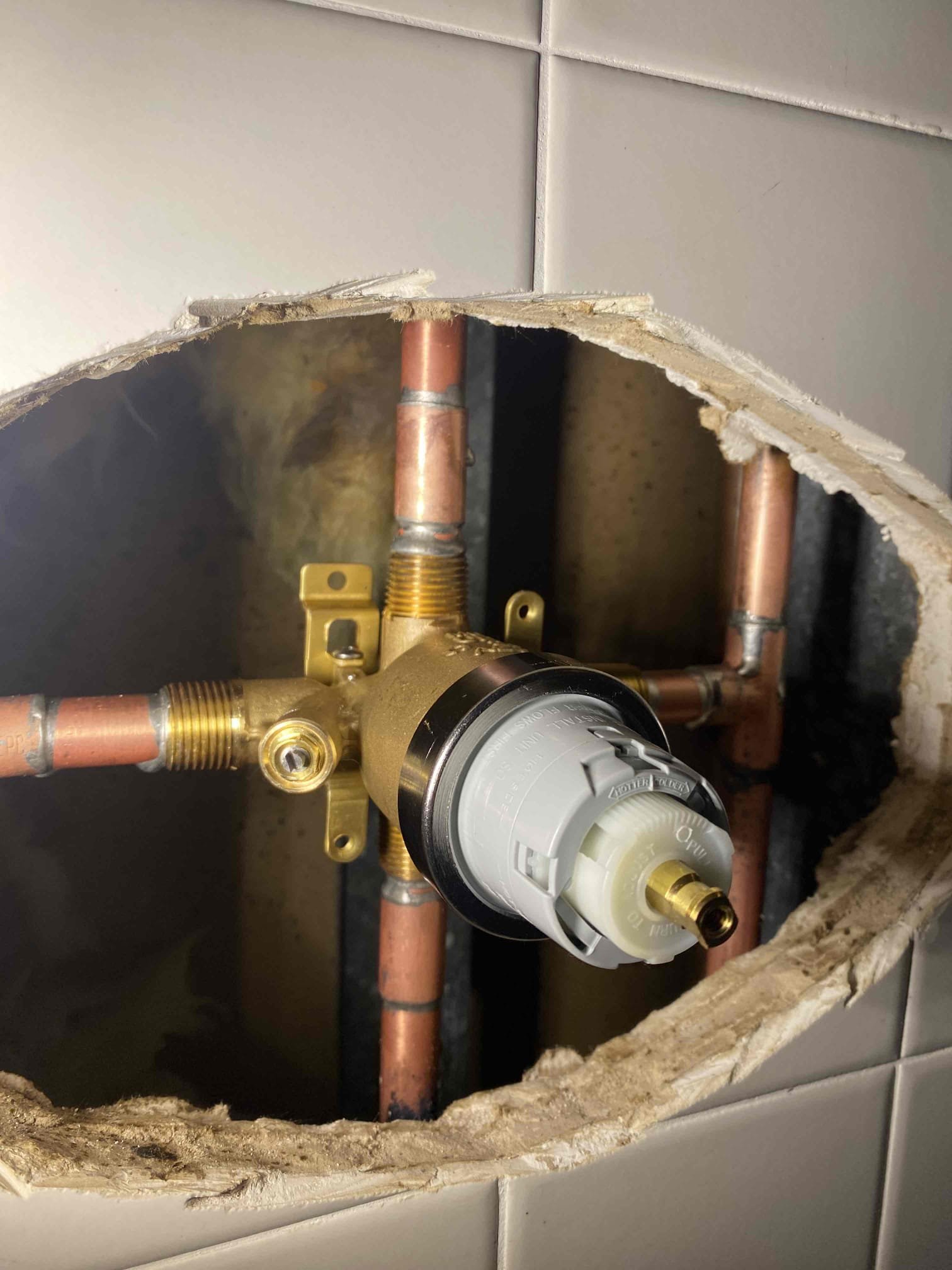 Confident, precise shower valve work by Magic Plumbing Heating & Cooling shows reliable craftsmanship and attention to lasting performance.