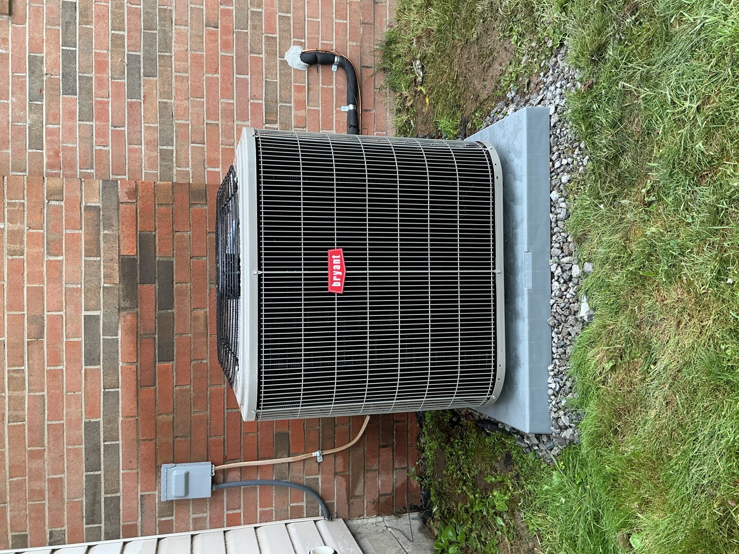 A clean, professionally installed Bryant outdoor unit shows the reliable craftsmanship homeowners trust from Boehmer Heating & Cooling.