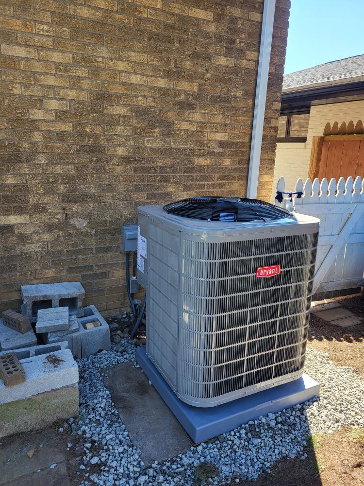 Clean, code-conscious installation like this Bryant outdoor unit shows how Boehmer Heating & Cooling delivers reliable, professional results.