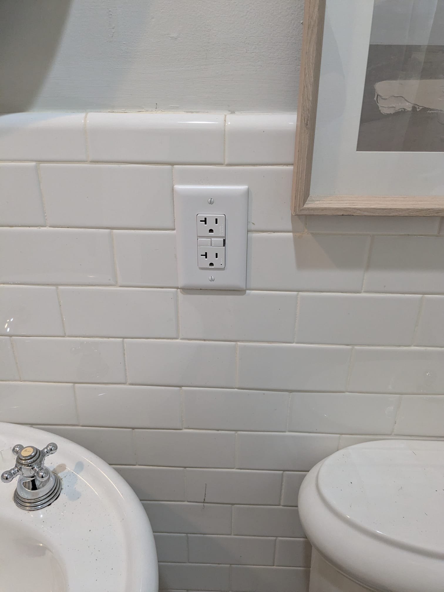 Upgrade your bathroom's safety and style with a professionally installed GFCI outlet from Aardvark Electric, Inc. Trust us to deliver quality and peace of mind.