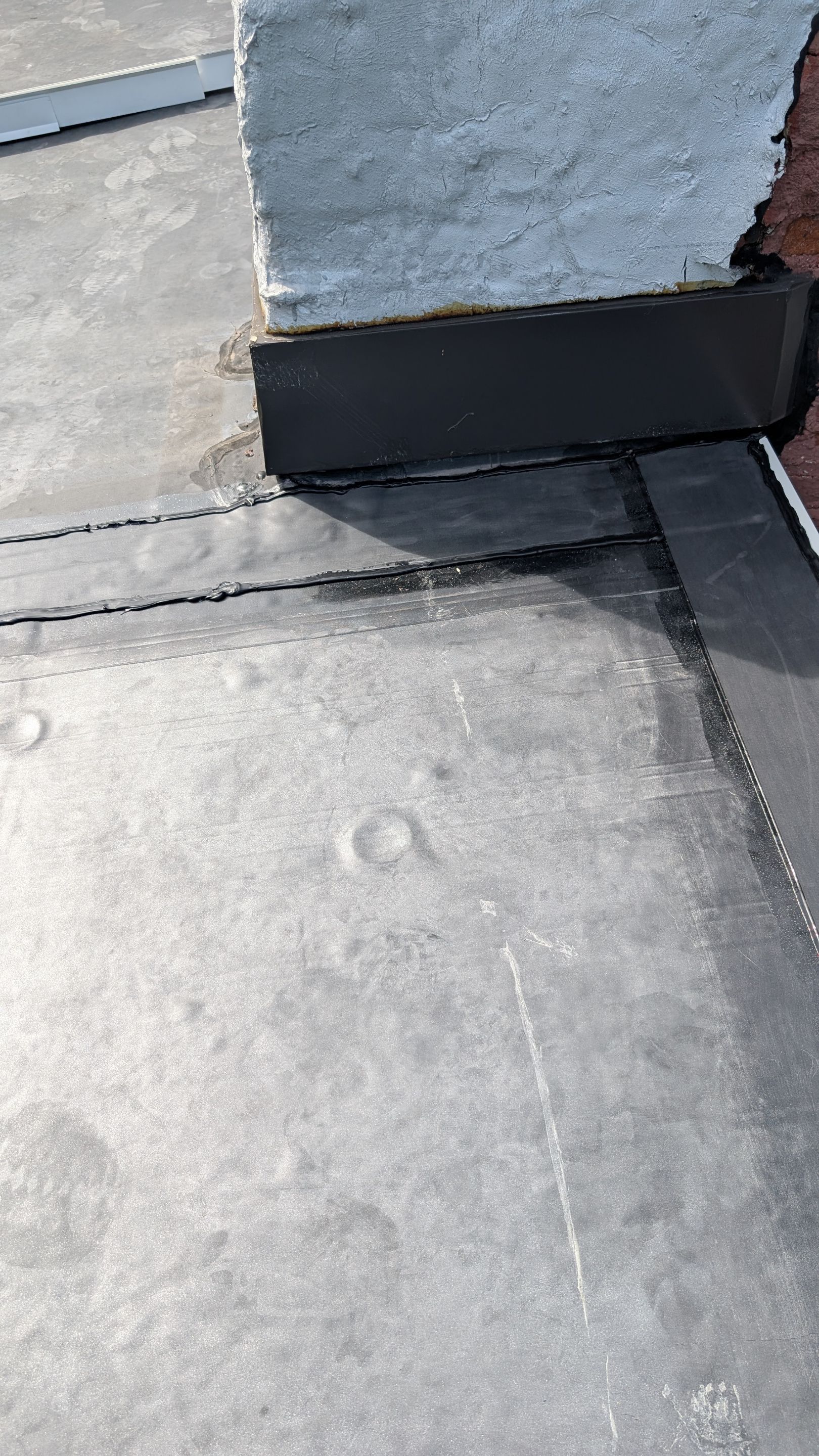 Mosaic Roofing & Exteriors delivers durable flat roof repairs with precise flashing detail to protect your building and prevent leaks.