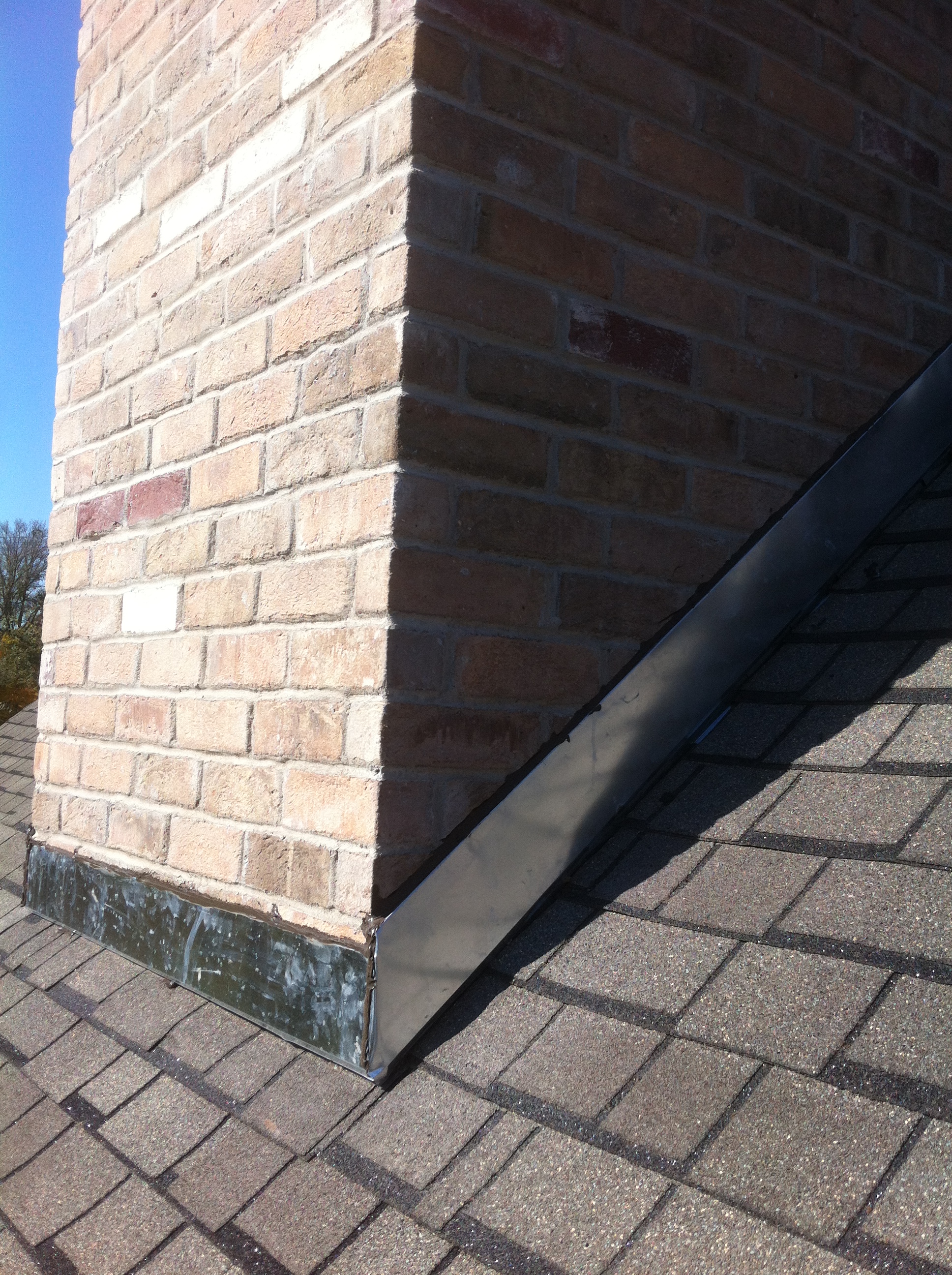 Ensure your home is protected with Americana Roofing's expert chimney flashing and roofing solutions.
