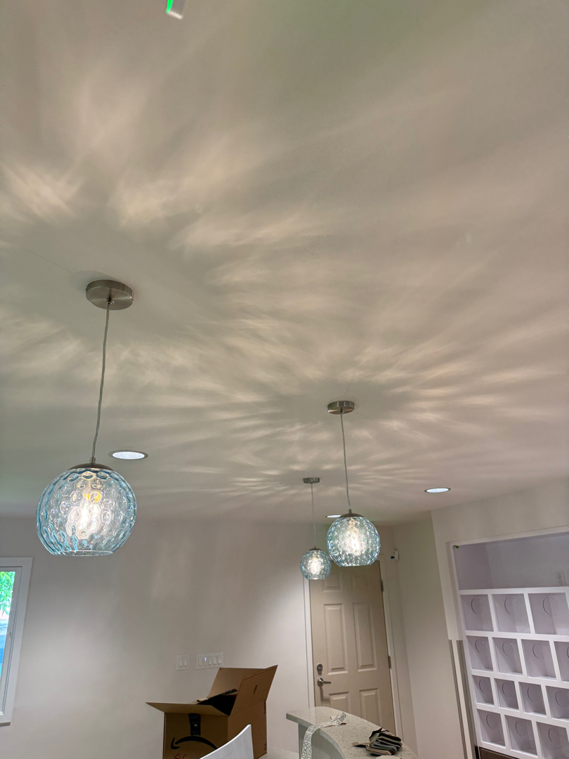 Illuminate your space with expert lighting solutions from Next Level Pros, ensuring quality and modern aesthetics.