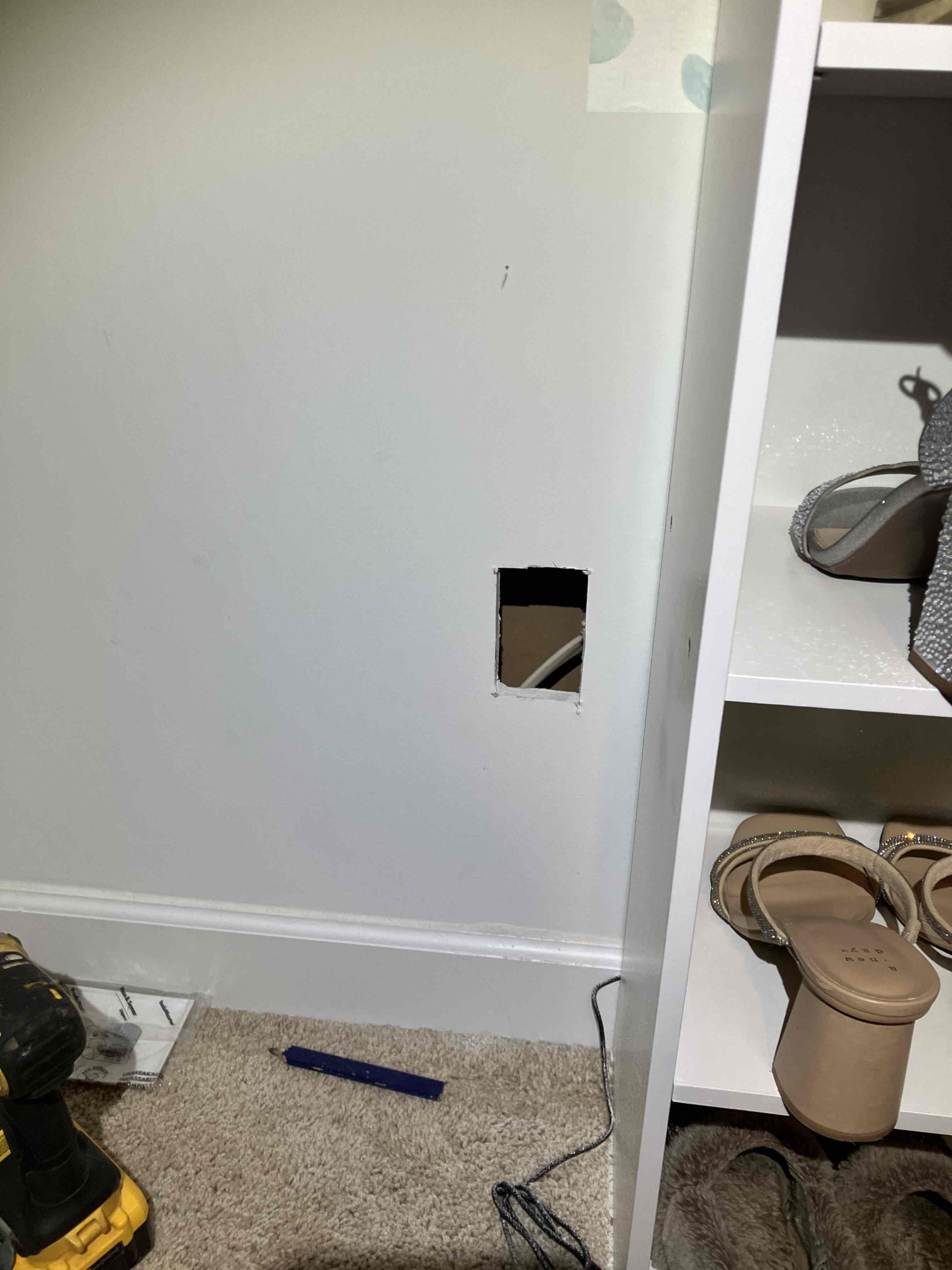 Inside a lived-in home, Dawson's Electric & Air neatly accessed wiring to complete the job with care and respect for the space.