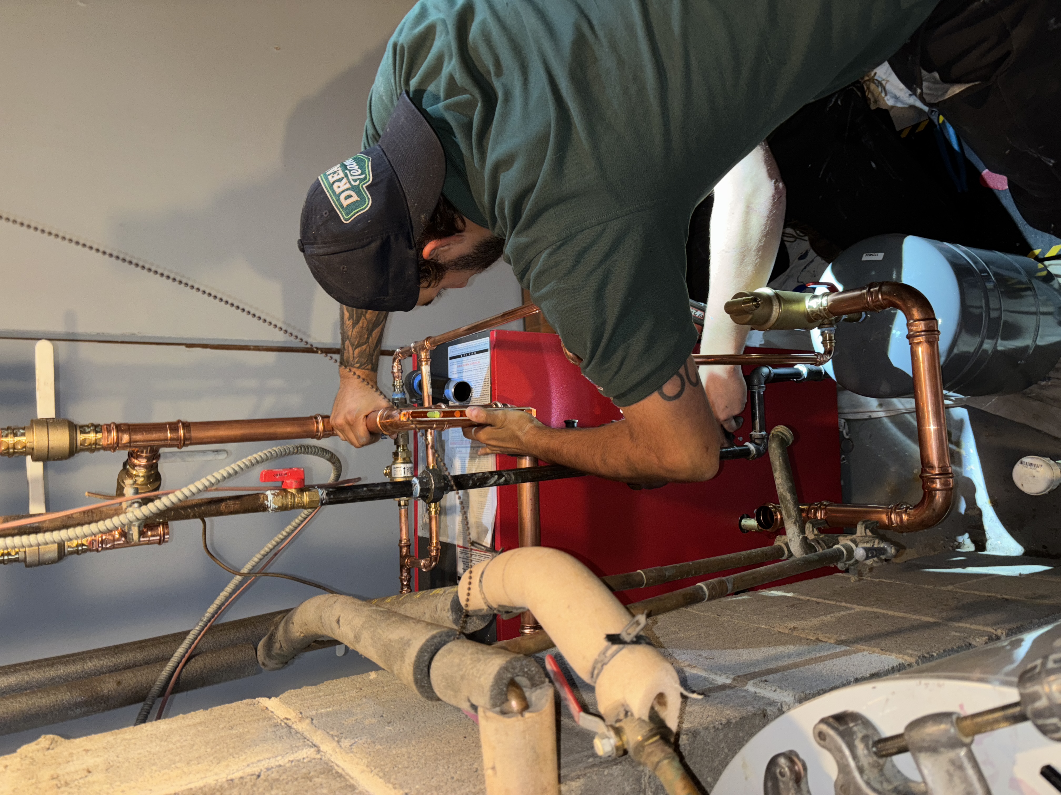 Dream Team - Plumbing, Heating, Cooling, & Electric ensures top-notch craftsmanship with skilled technicians handling all your plumbing needs.