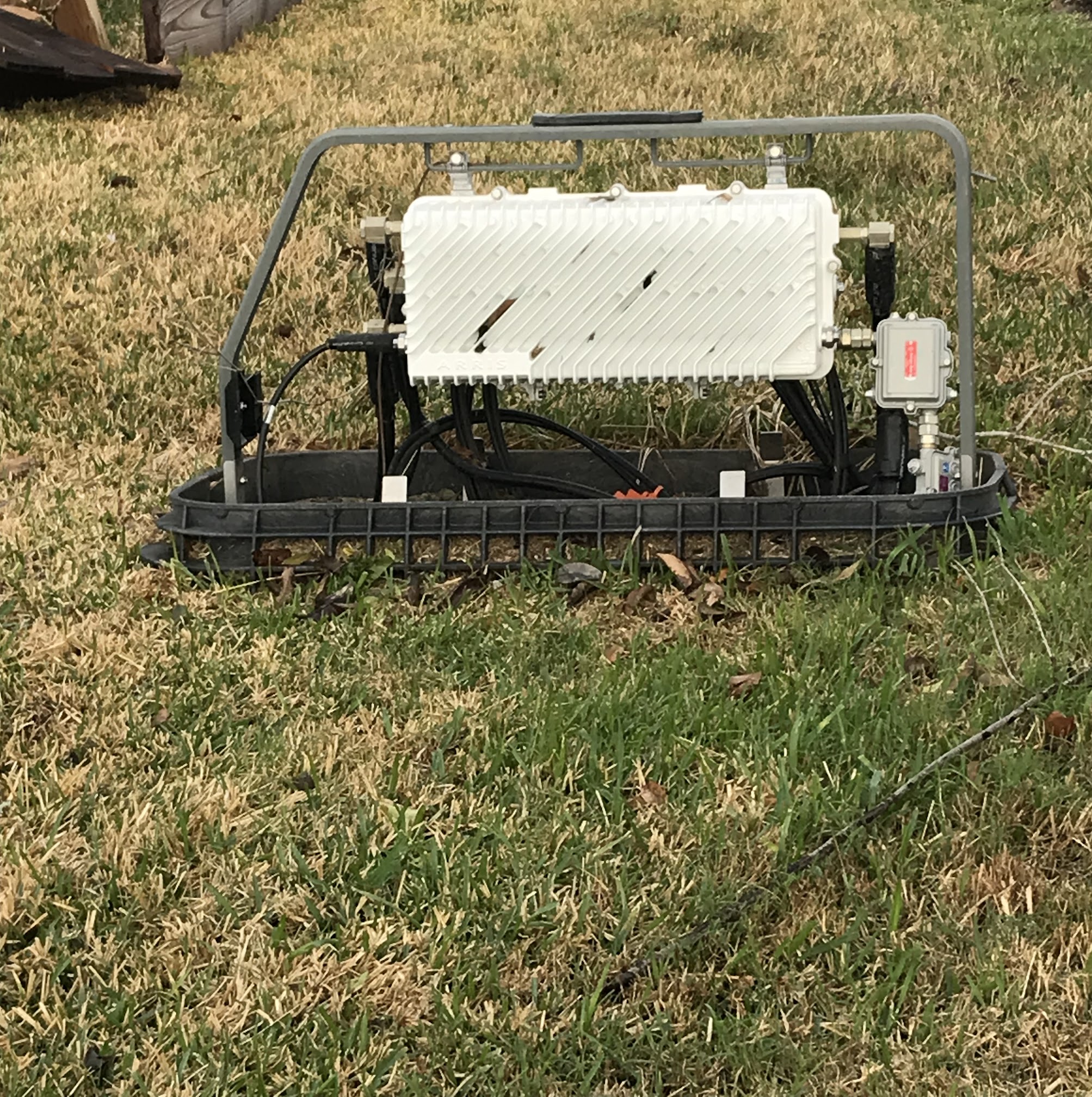 Abacus Plumbing, Air Conditioning & Electrical shows tidy outdoor cable and junction work that demonstrates reliable, professional installation for homeowners.