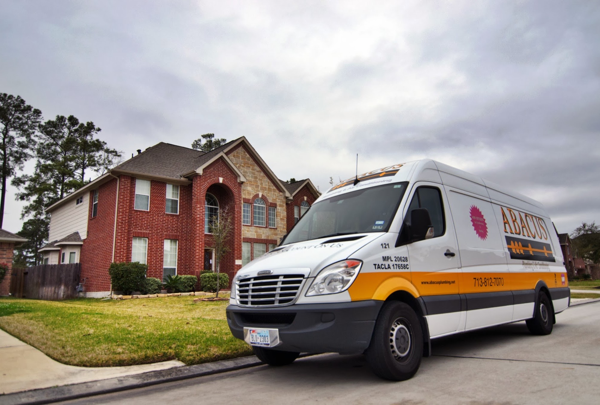 A clean, professional Abacus Plumbing, Air Conditioning & Electrical van arrives at a customer home to deliver reliable, trusted service.