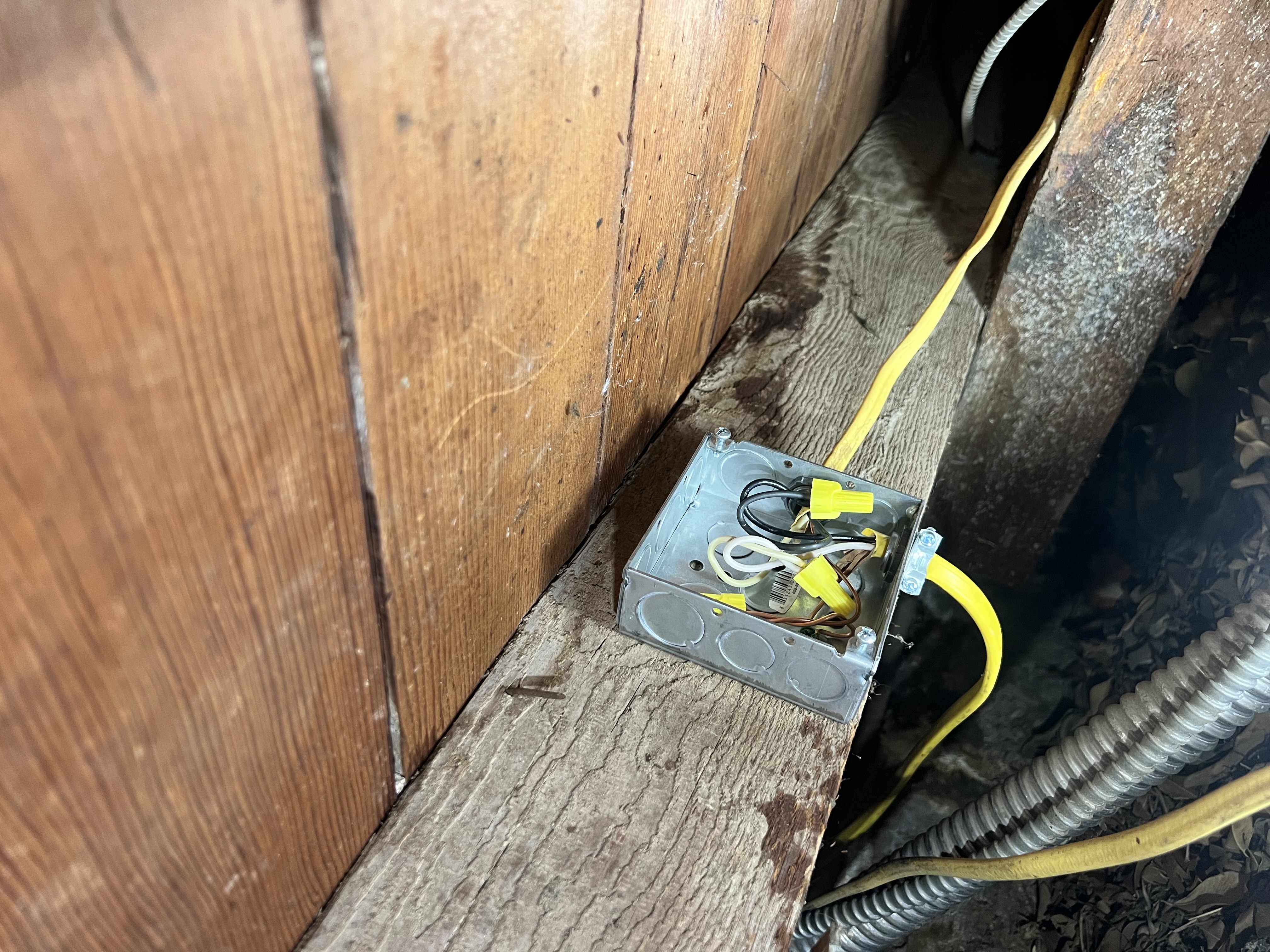 Powell Electric demonstrates careful, code-minded wiring in tight crawlspace conditions to deliver reliable, long-lasting service.