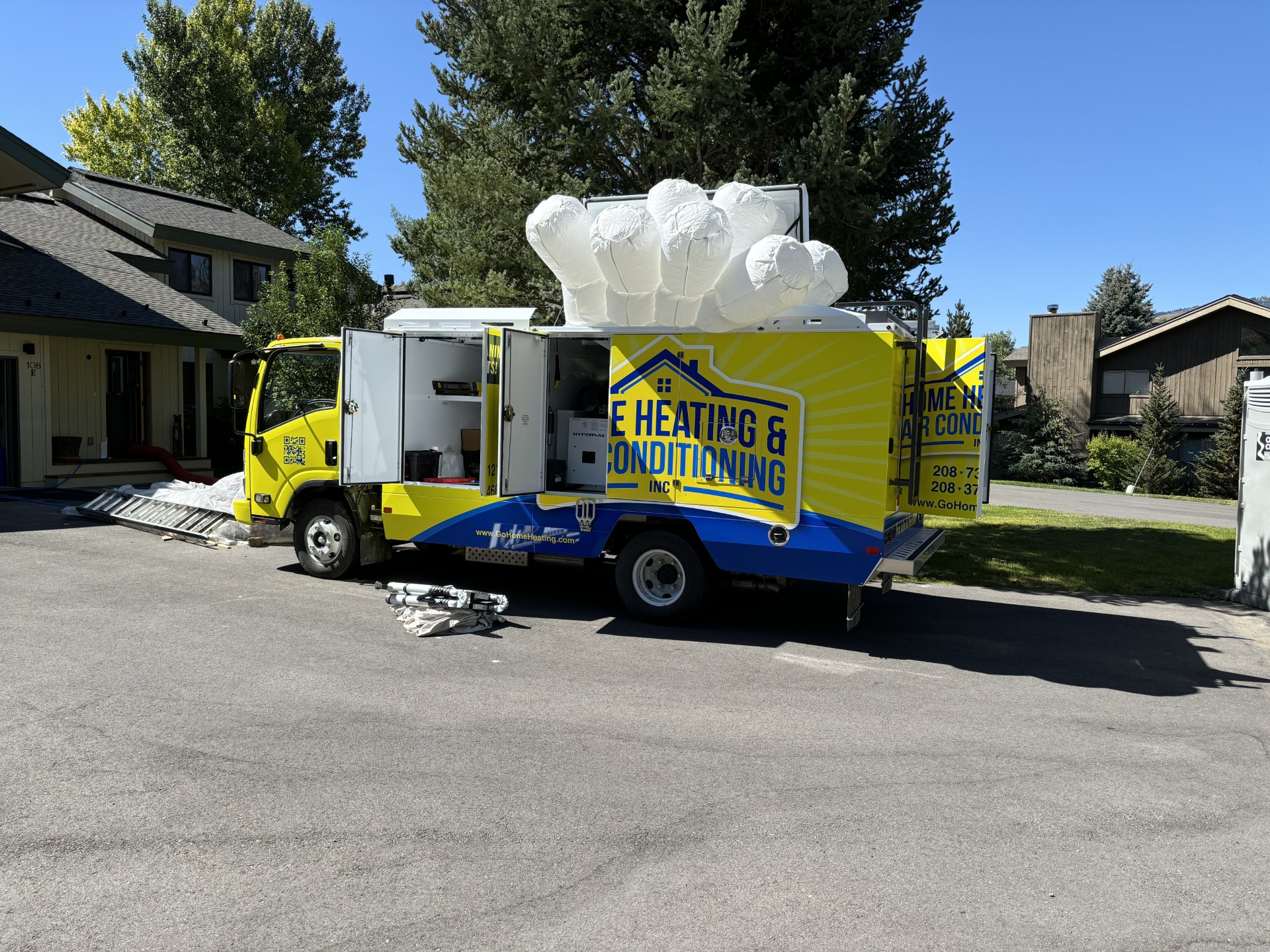Home Heating & Air Conditioning demonstrates professional, careful on-site service with clean equipment and skilled installation for your home.