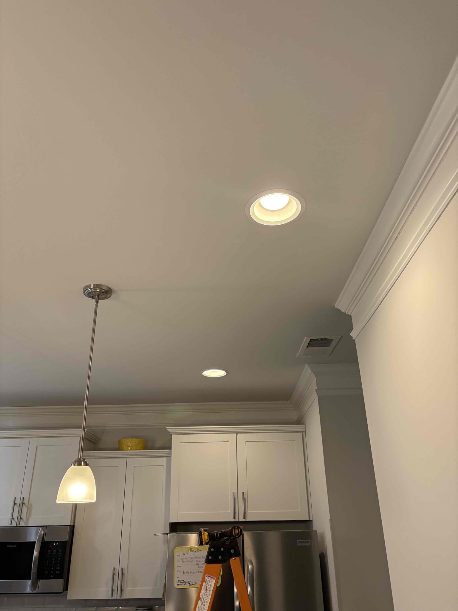 Bright, well finished kitchen lighting showcases Dawson's Electric & Air commitment to reliable, tidy installations customers trust.