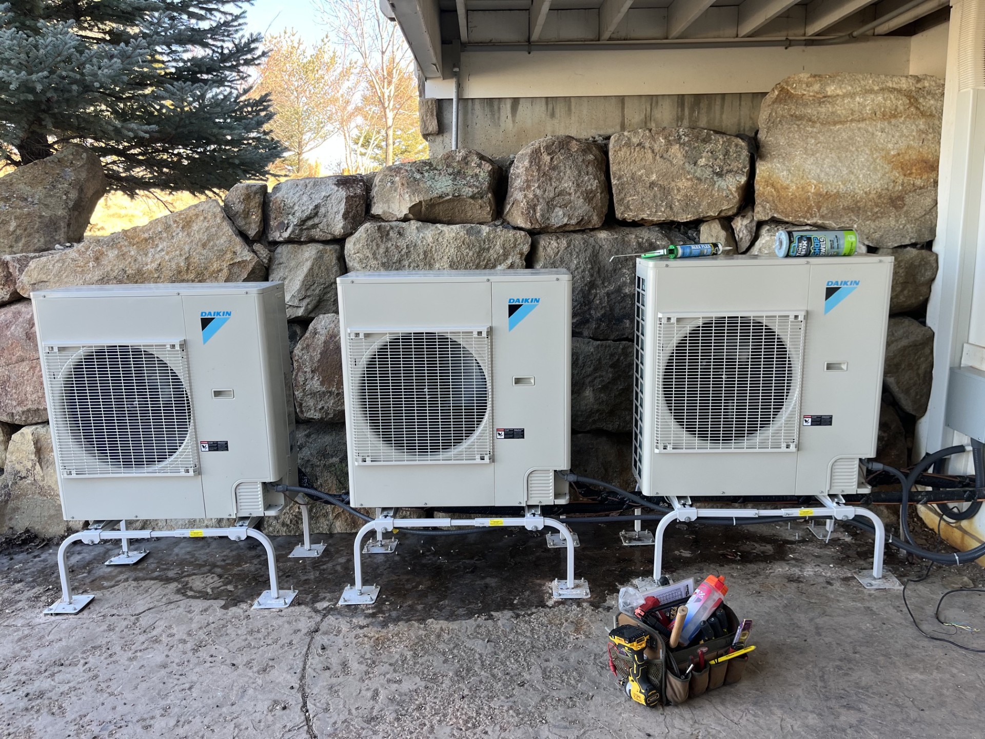 Clean, reliable installation of multiple heat pump units shows the care and durability customers expect from Home Heating & Air Conditioning.