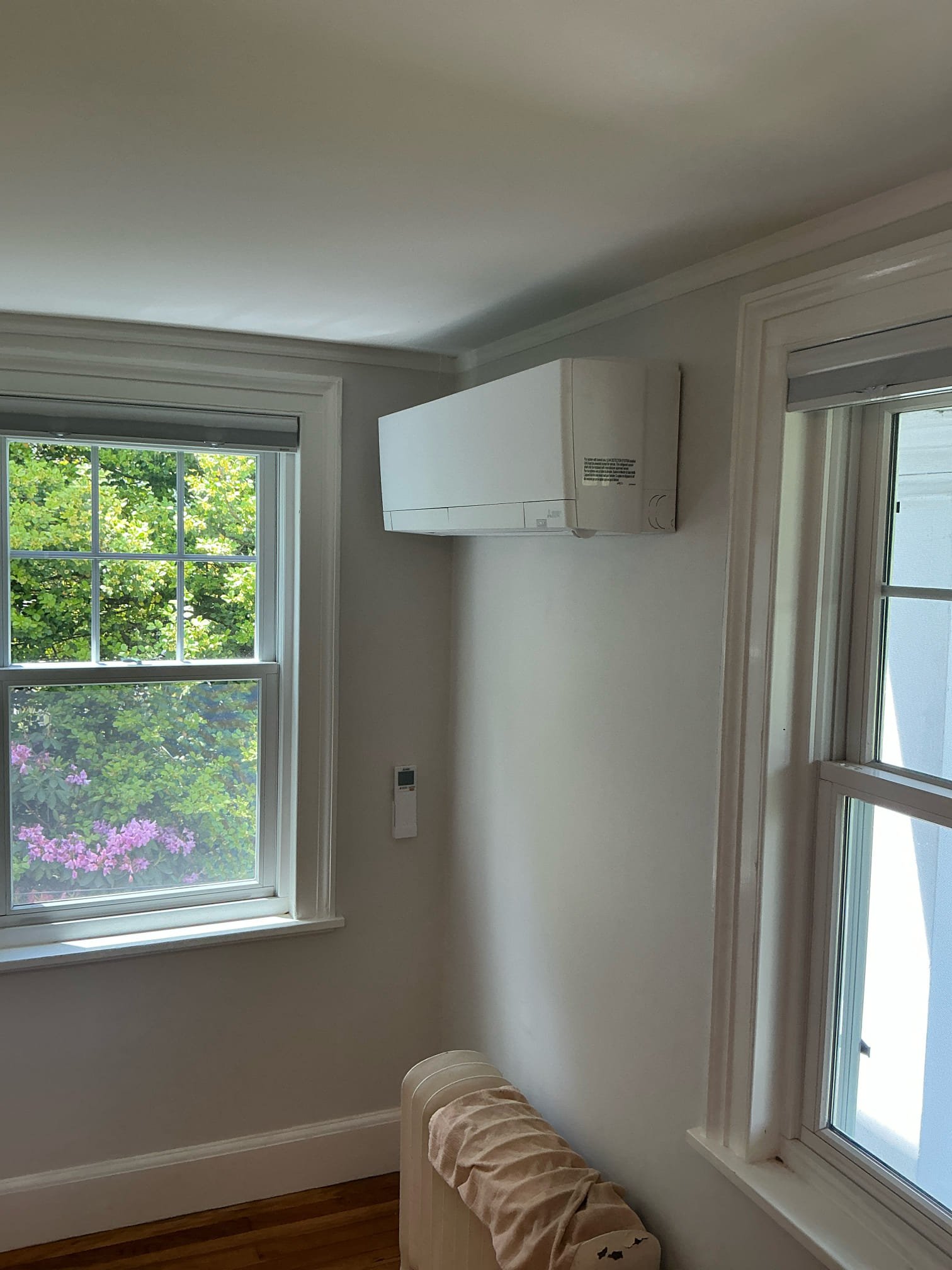 A neatly installed ductless mini-split showcases Akian Plumbing, Heating, Cooling & Electric's reliable craftsmanship and attention to detail.