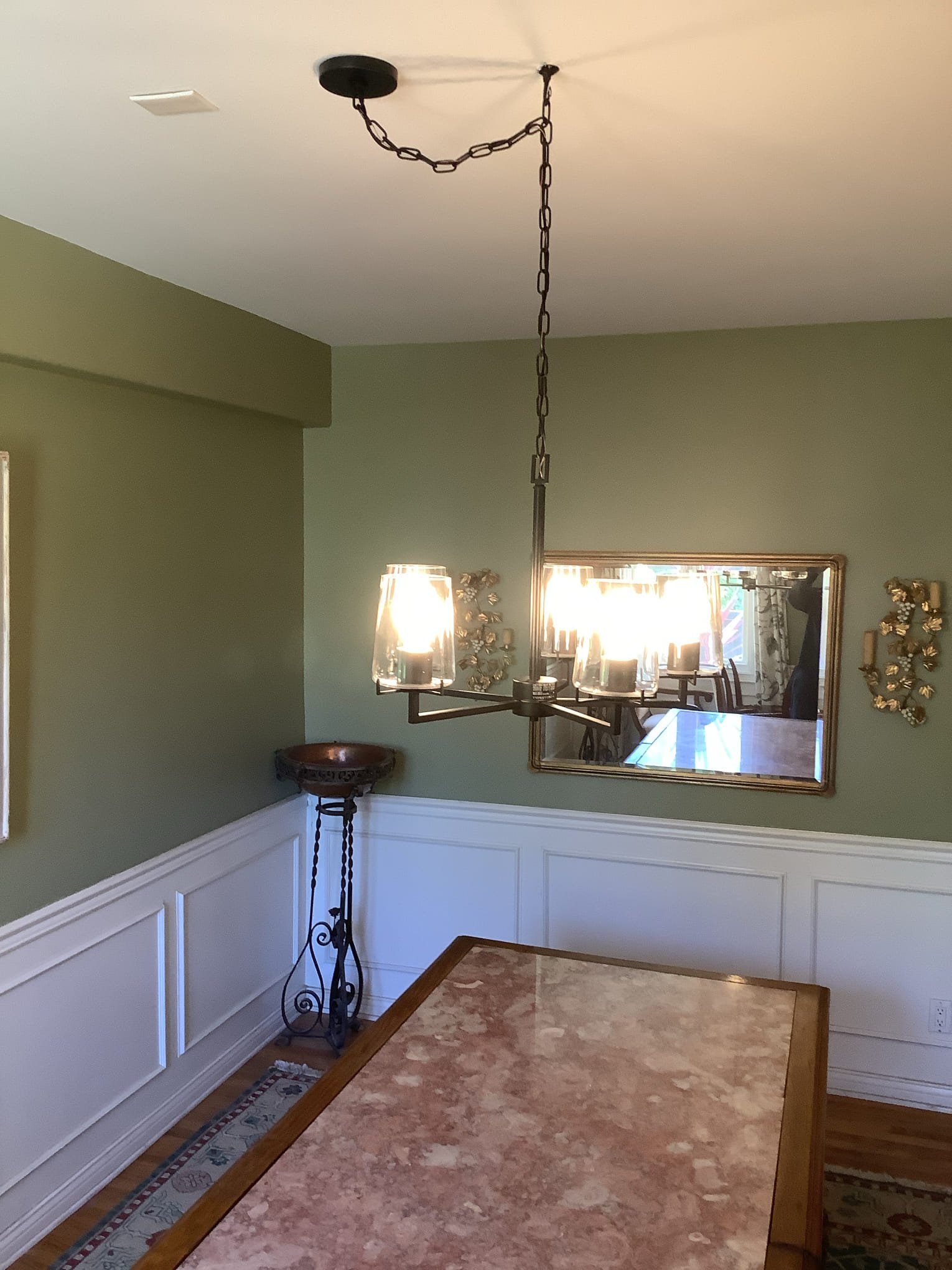 Powell Electric installed this elegant dining chandelier with care, delivering polished lighting that enhances the room's character.