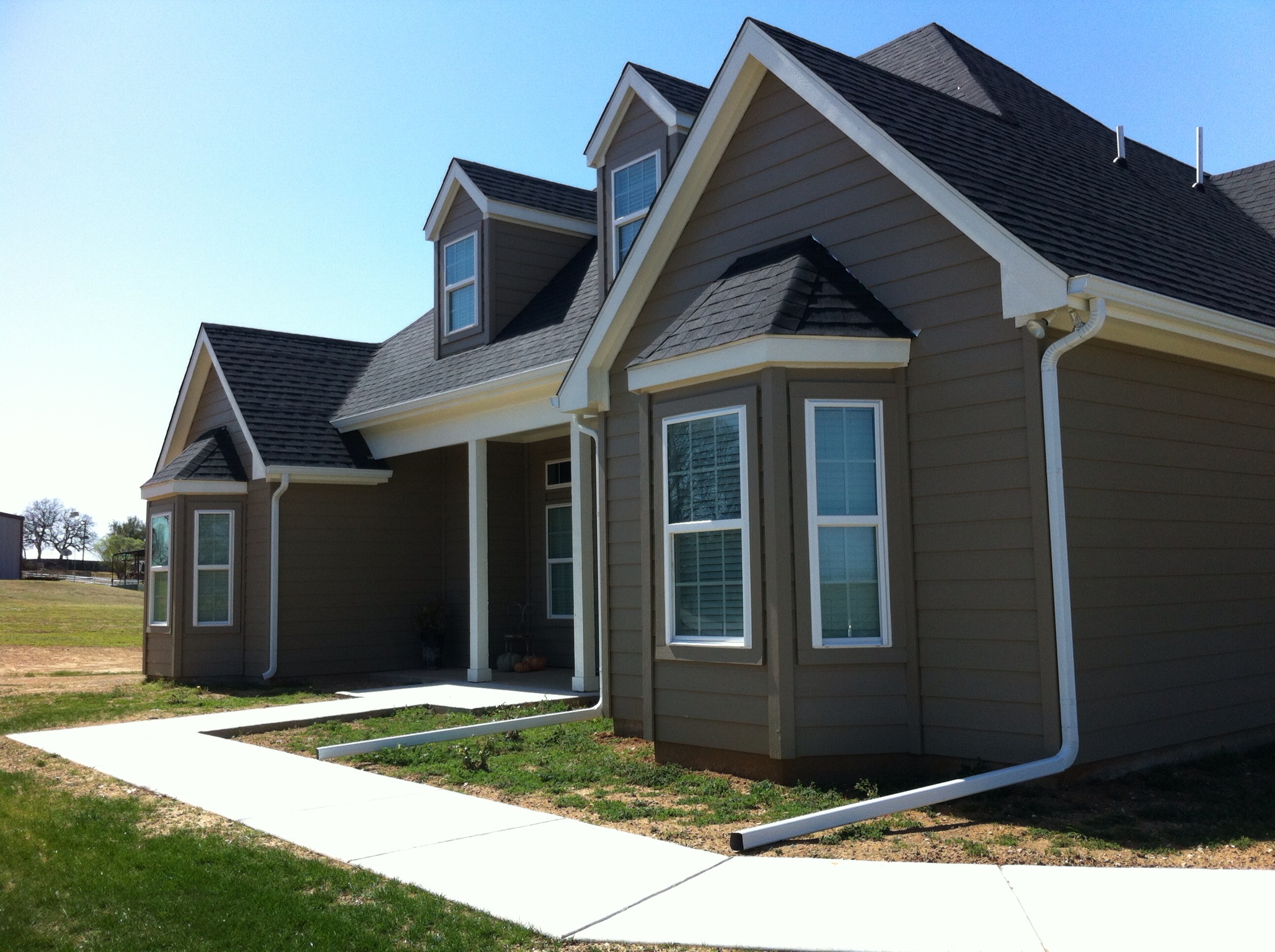 Enhance your home with Americana Roofing's professional roof installation and gutter services. Experience quality and professionalism that stands the test of time.