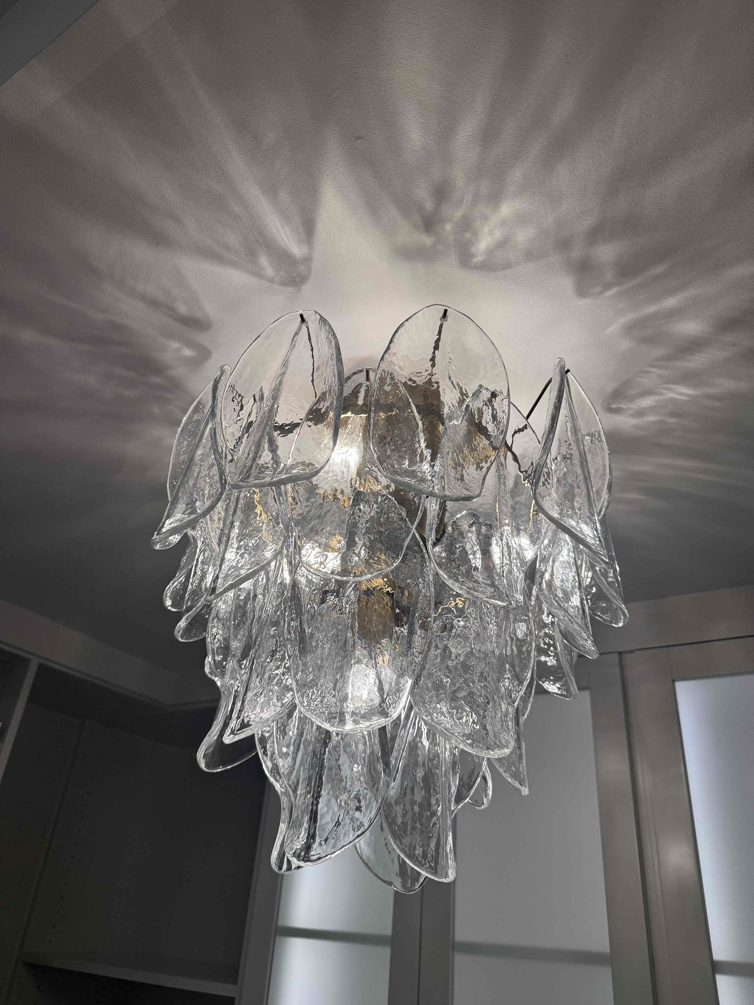 Powell Electric installed this elegant glass chandelier to bring refined, reliable lighting and lasting craftsmanship to the home.