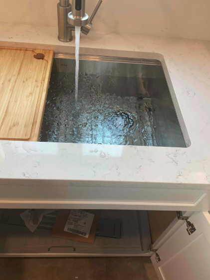 A spotless, fully functional sink installation shows Hope Plumbing's attention to detail and reliable workmanship for your kitchen upgrade.