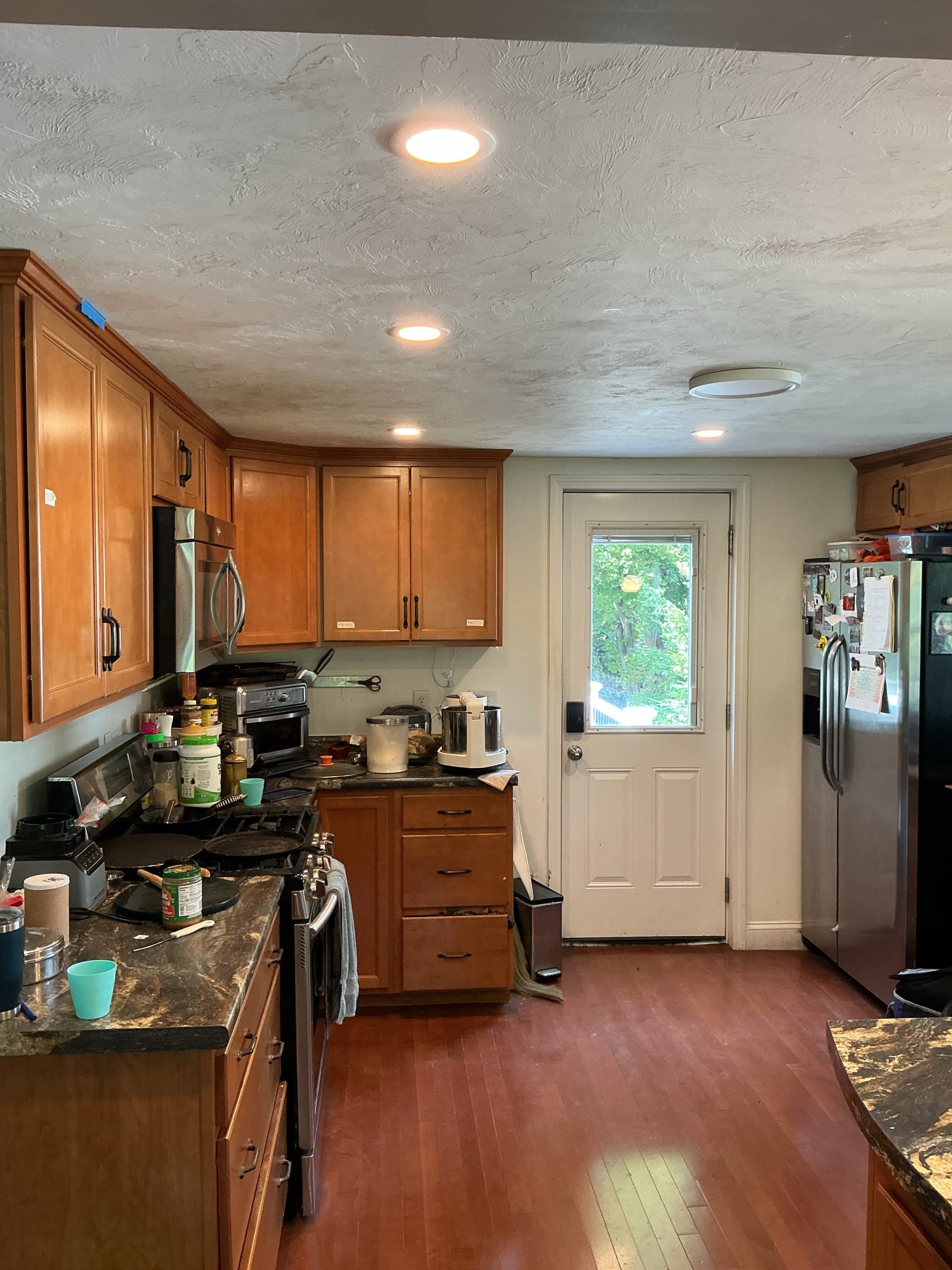 Enhance your home with Castle Electric Inc.'s top-notch lighting solutions, adding modern elegance to your kitchen.